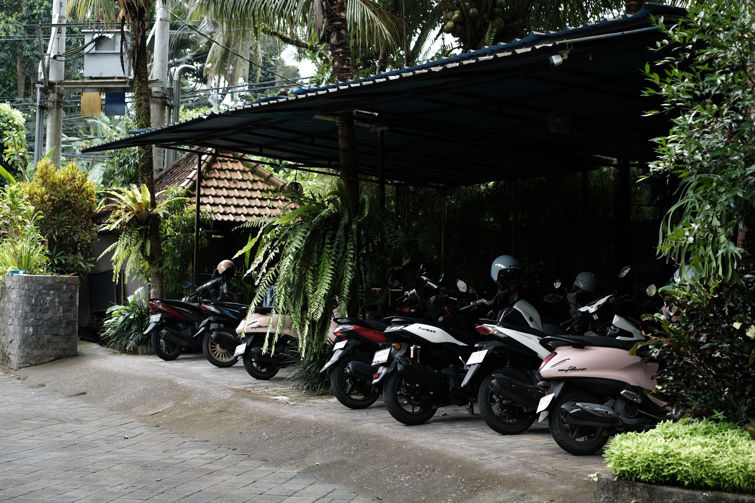 Plenty of parking for cars, scooters and buses