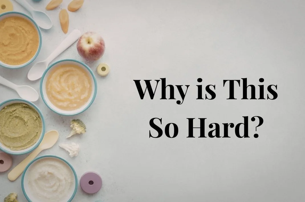 A flat lay of various baby food jars and utensils on a white background, with the text "Why is This So Hard?" in bold black letters.