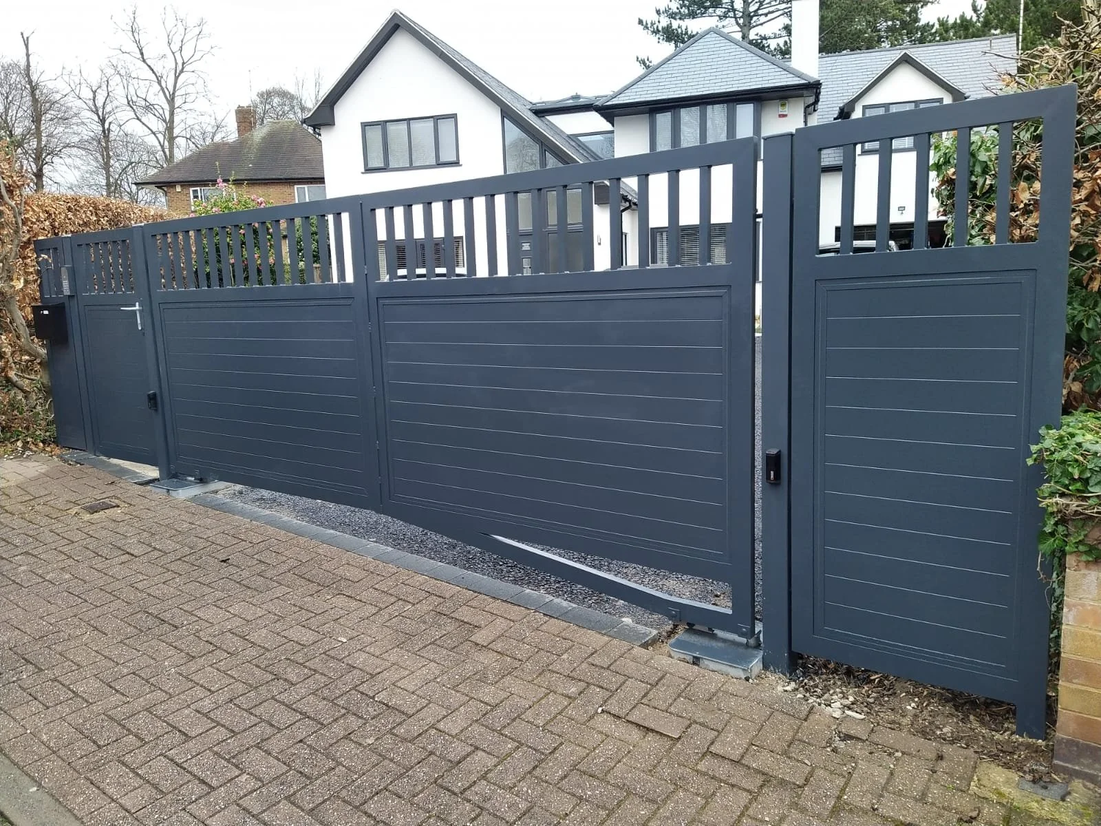 automatic Custom driveway and garden gates fabricated by Gemfabs Nottingham