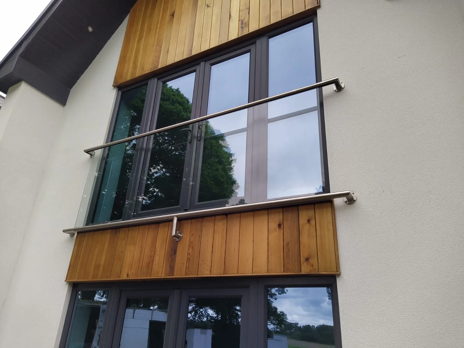 Bespoke stainless steel railings, balconies and Juliet balconies designed for homes by Gemfabs Nottingham steel fabricators