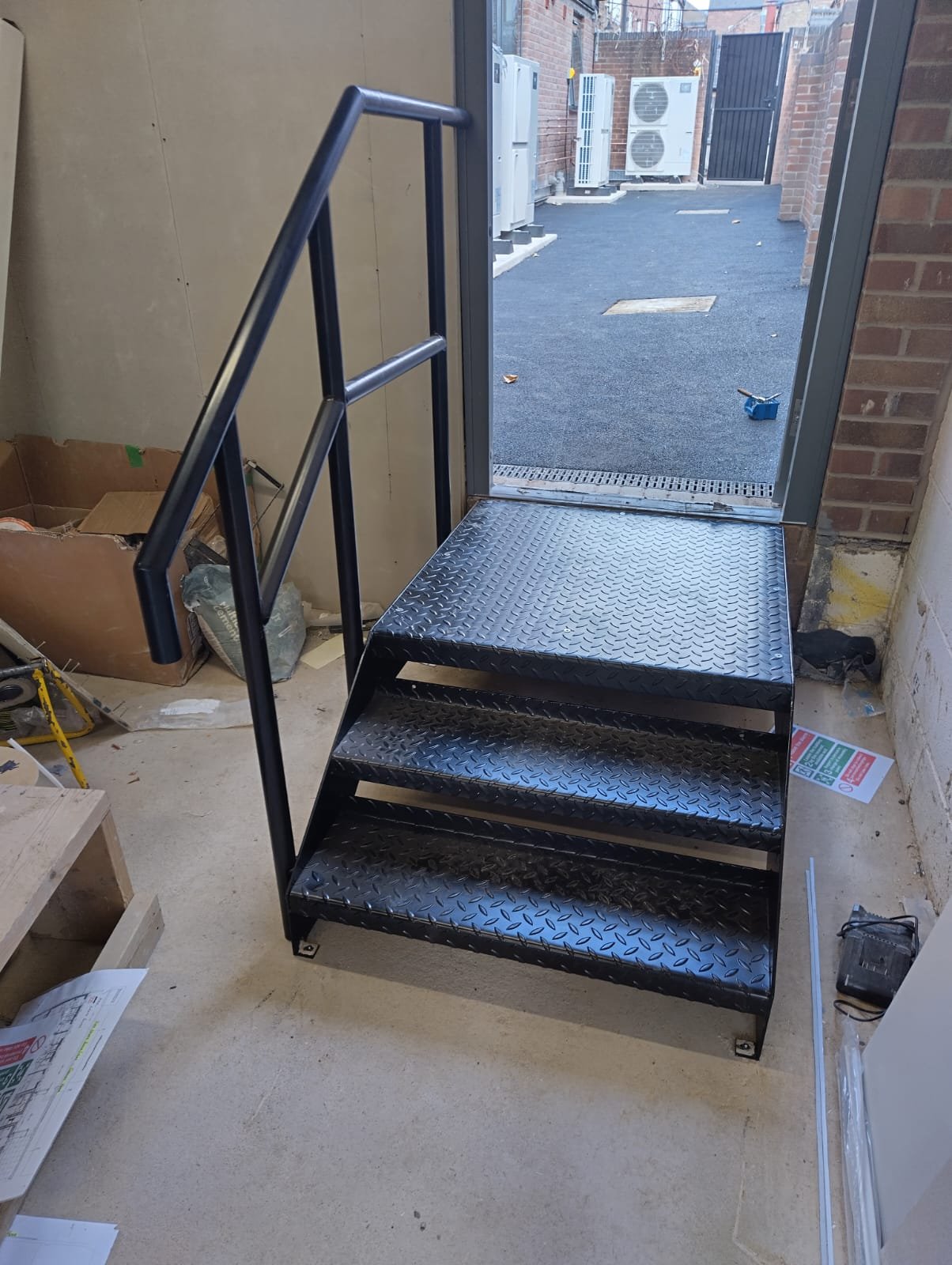 steel fire escape staircase fabricated and installed by Gemfabs