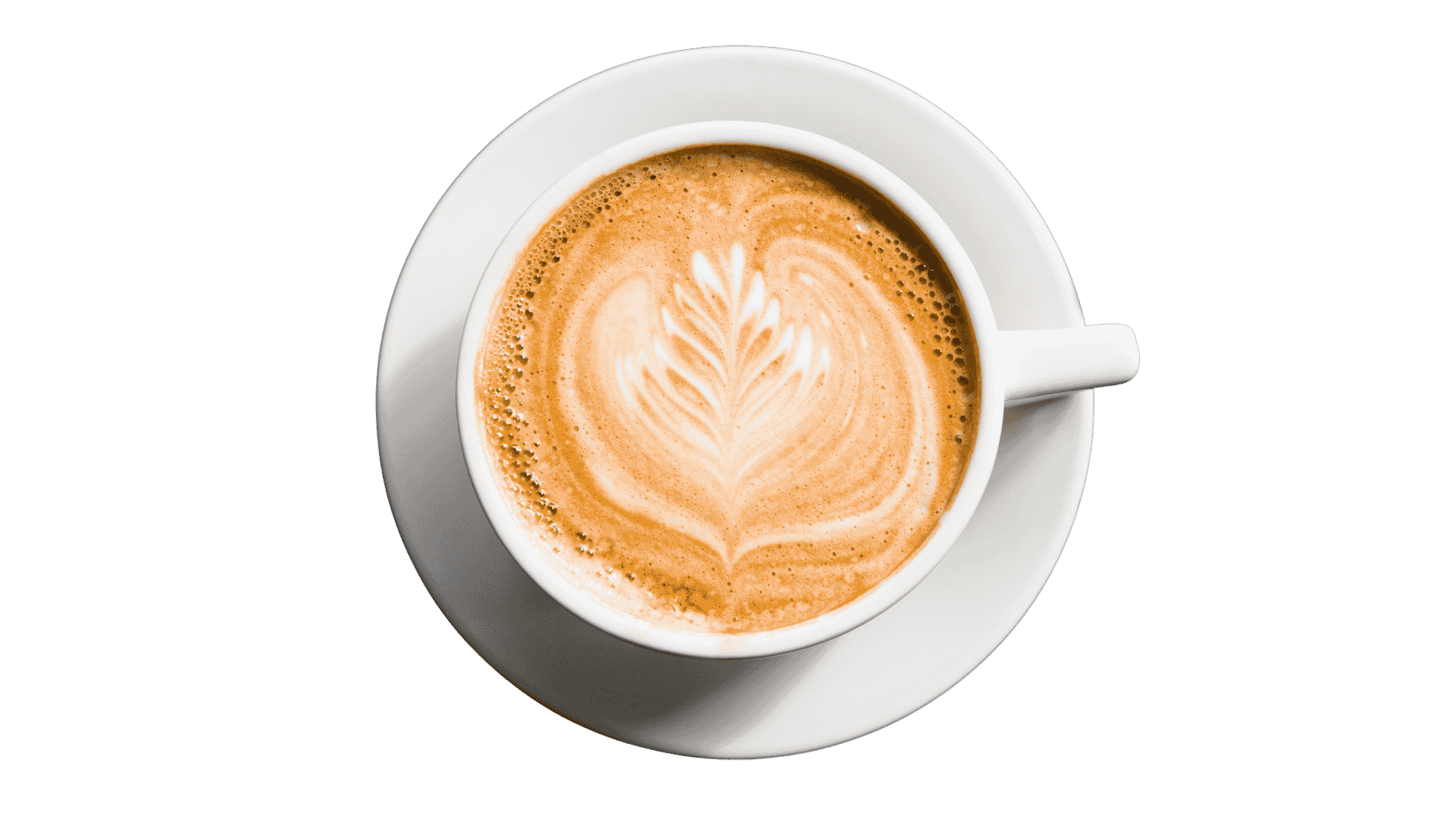 White cup of coffee with latte art on black background, viewed from above.