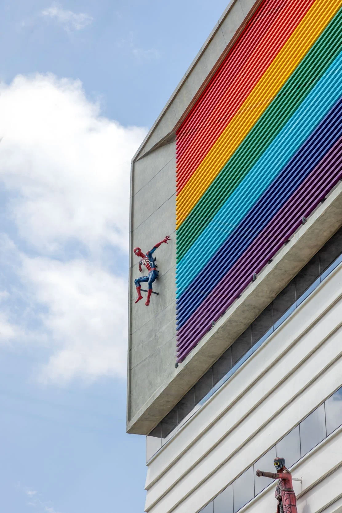 Commercial architecture photography showcasing a modern building exterior with vibrant, colorful architectural accents and clean lines