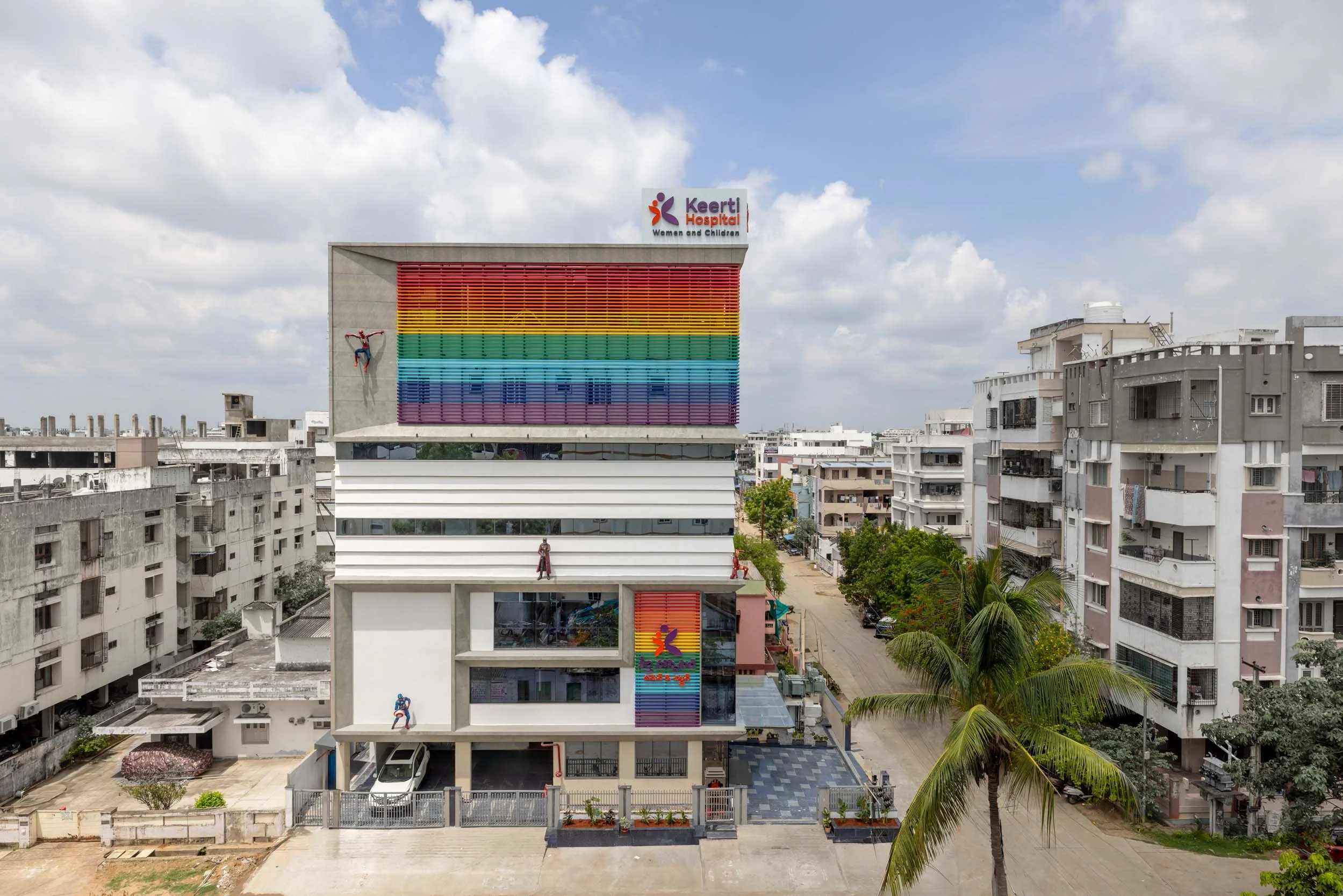 Commercial architecture photography showcasing a modern building exterior with vibrant, colorful architectural accents and clean lines.