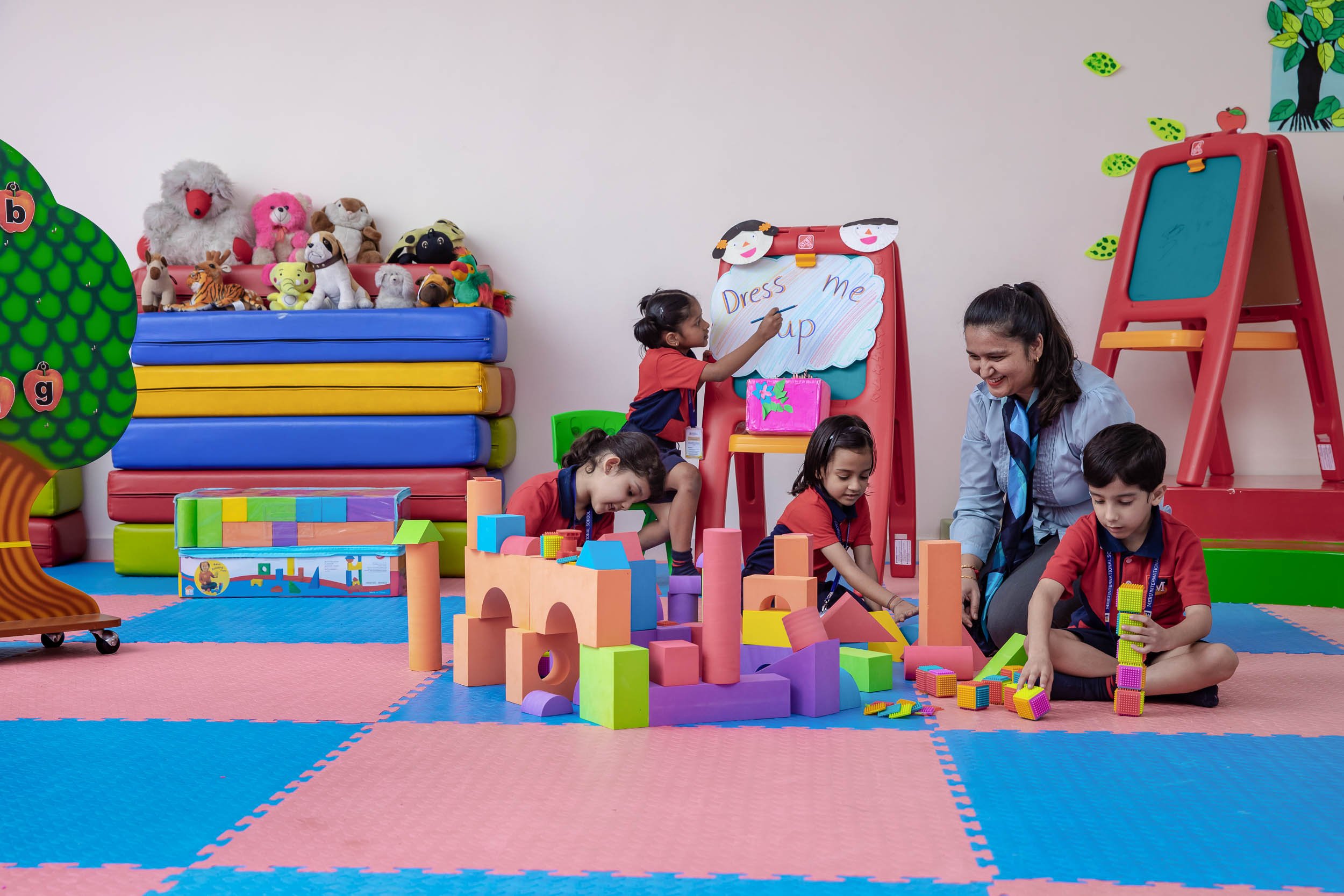 Interior photography of kindergarten students playing in a vibrant early learning center | Ravi Varma Photography & Films
