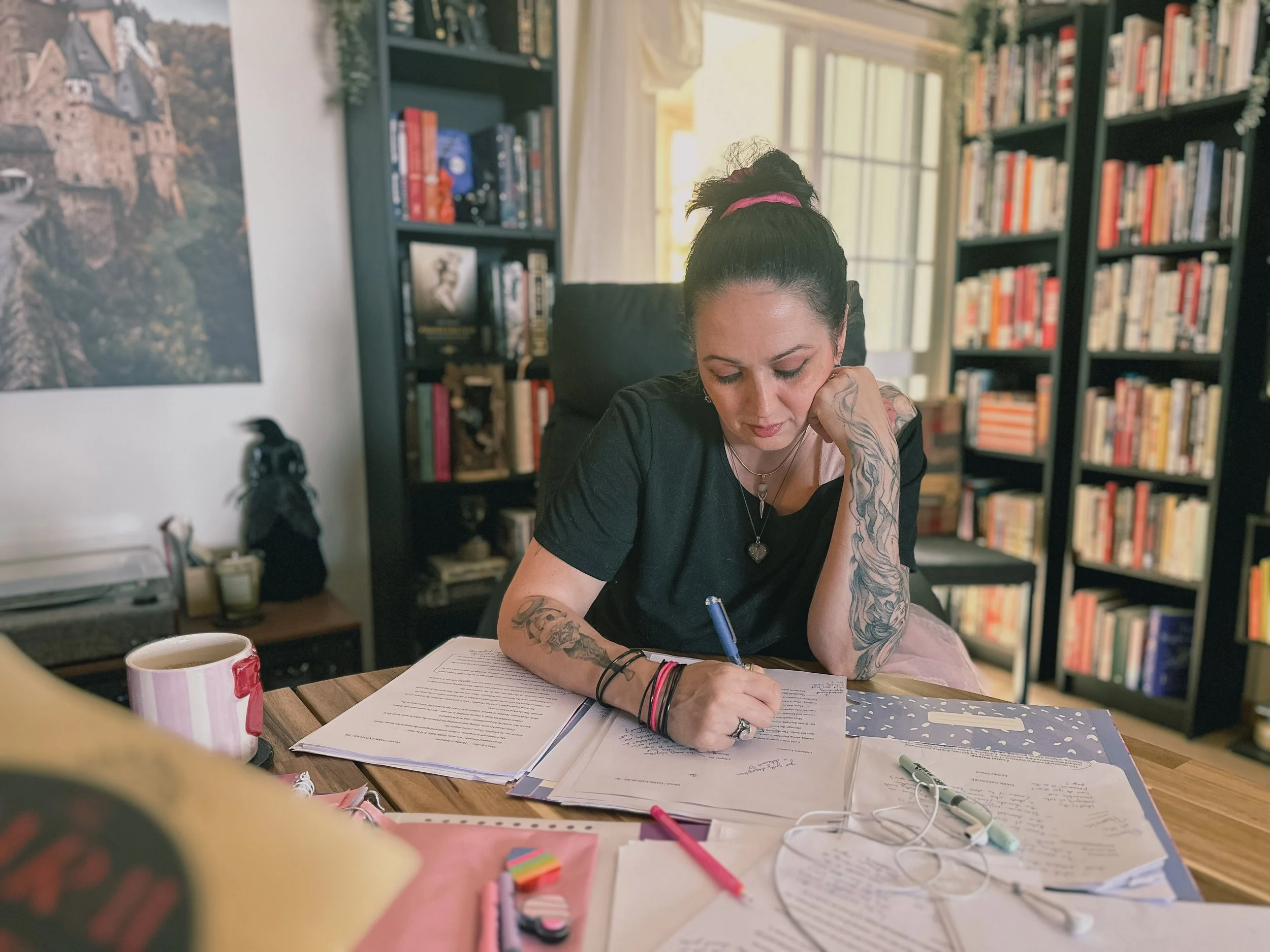 Elisa Grace working on a manuscript