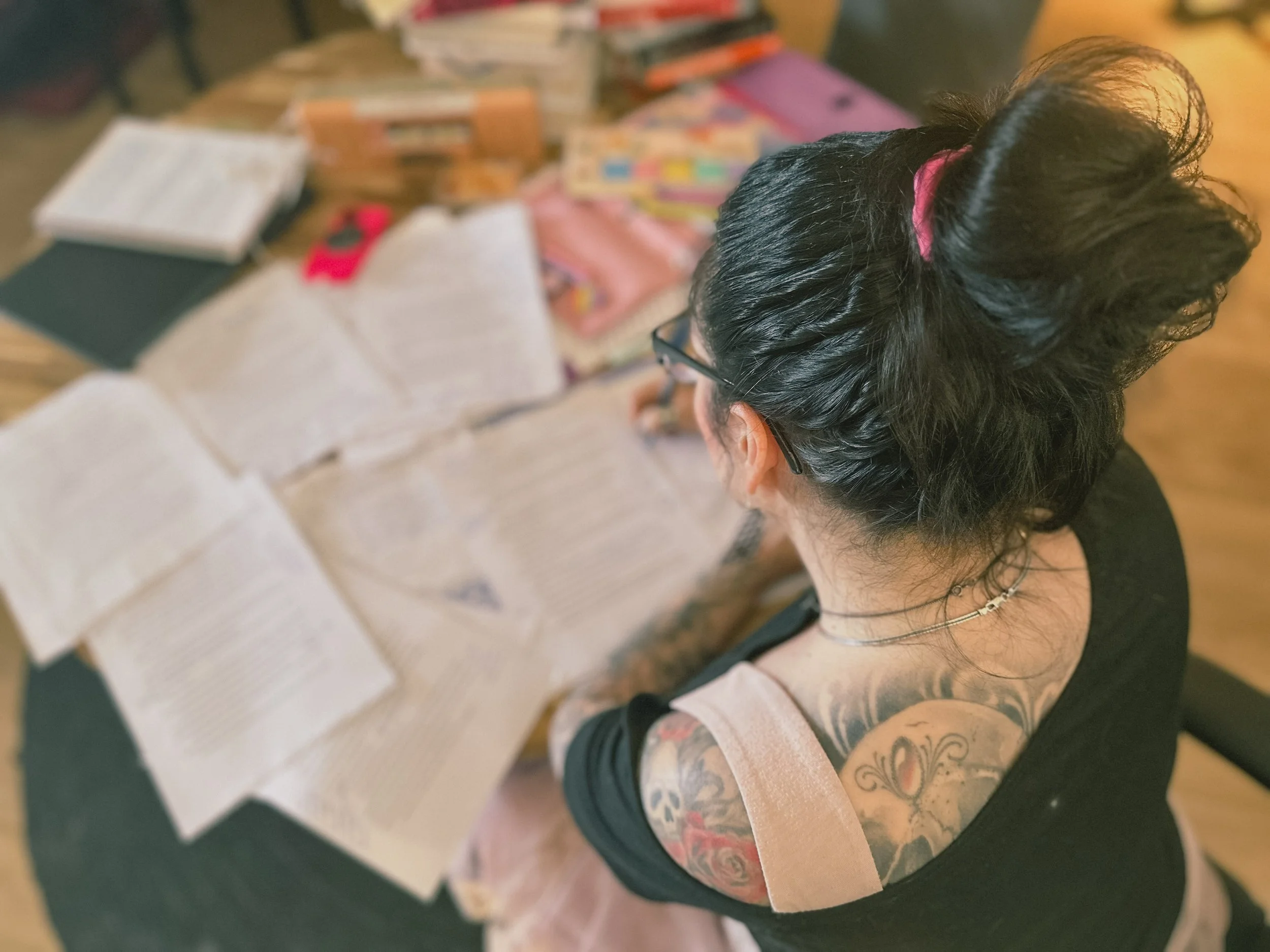 Elisa working on a manuscript