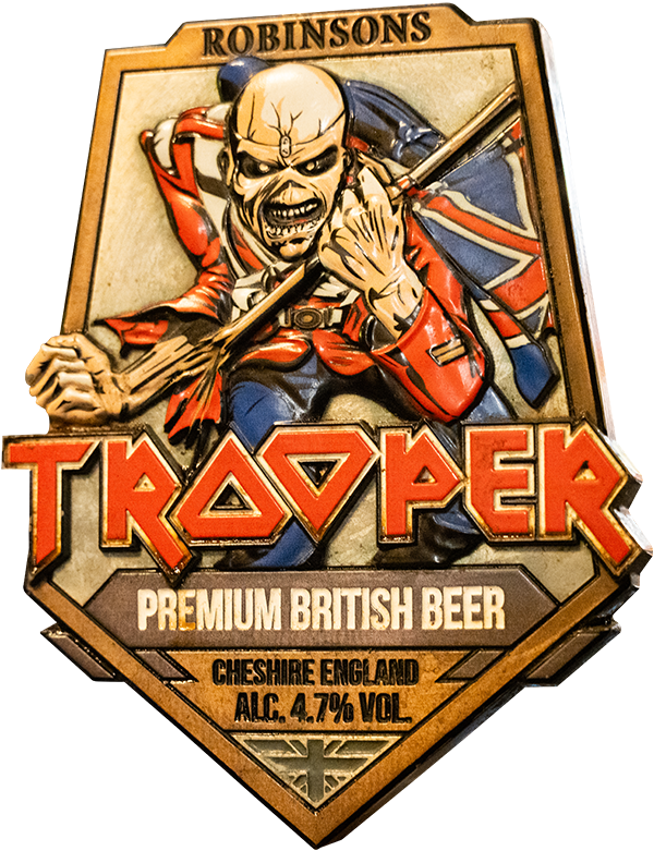 A beer label featuring a cartoon skeleton soldier playing a guitar, with the text "Robinsons Trapper Premium British Beer" and details "Cheshire England, Alc 4.7% Vol."