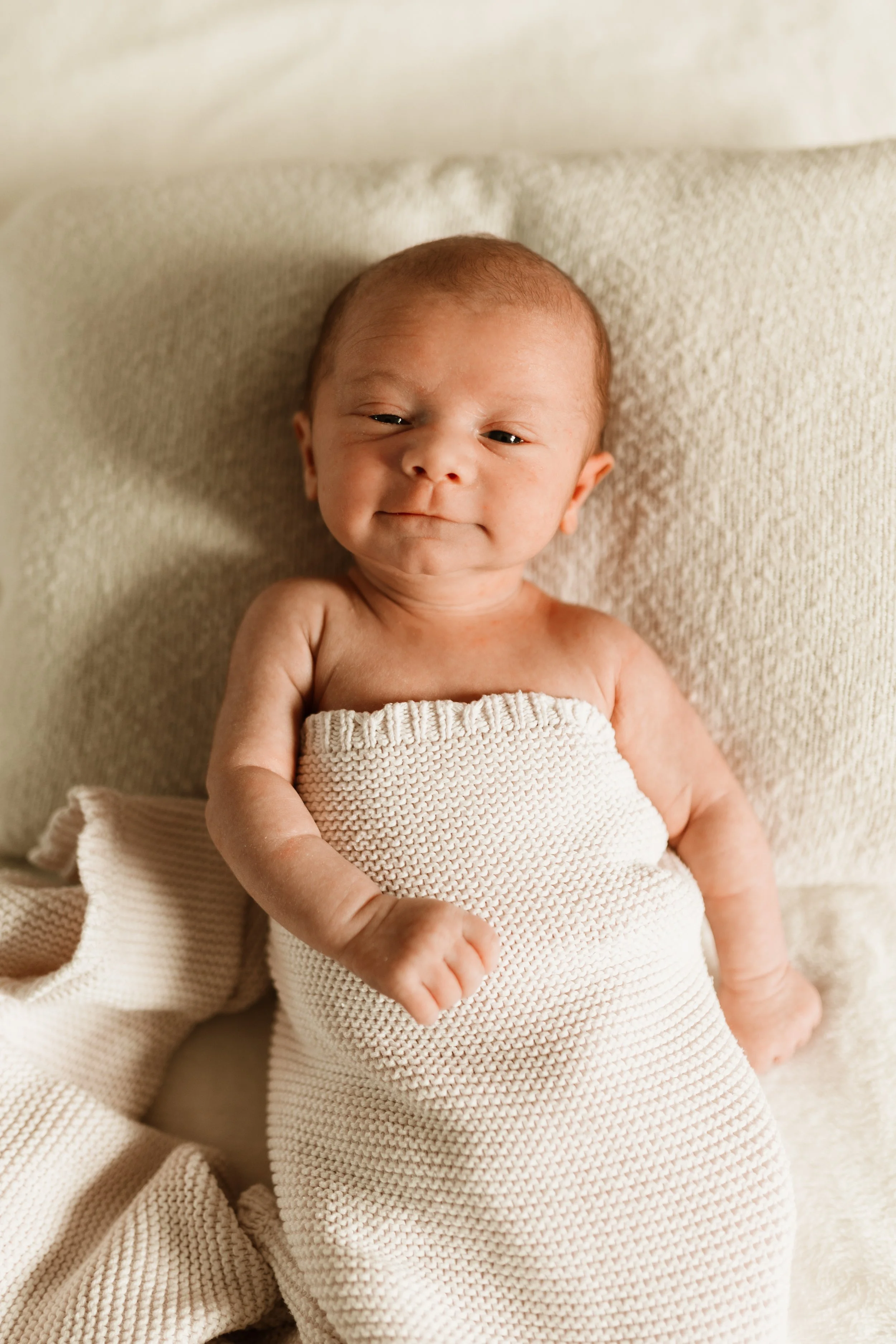 Natural light newborn photography at home in Toronto