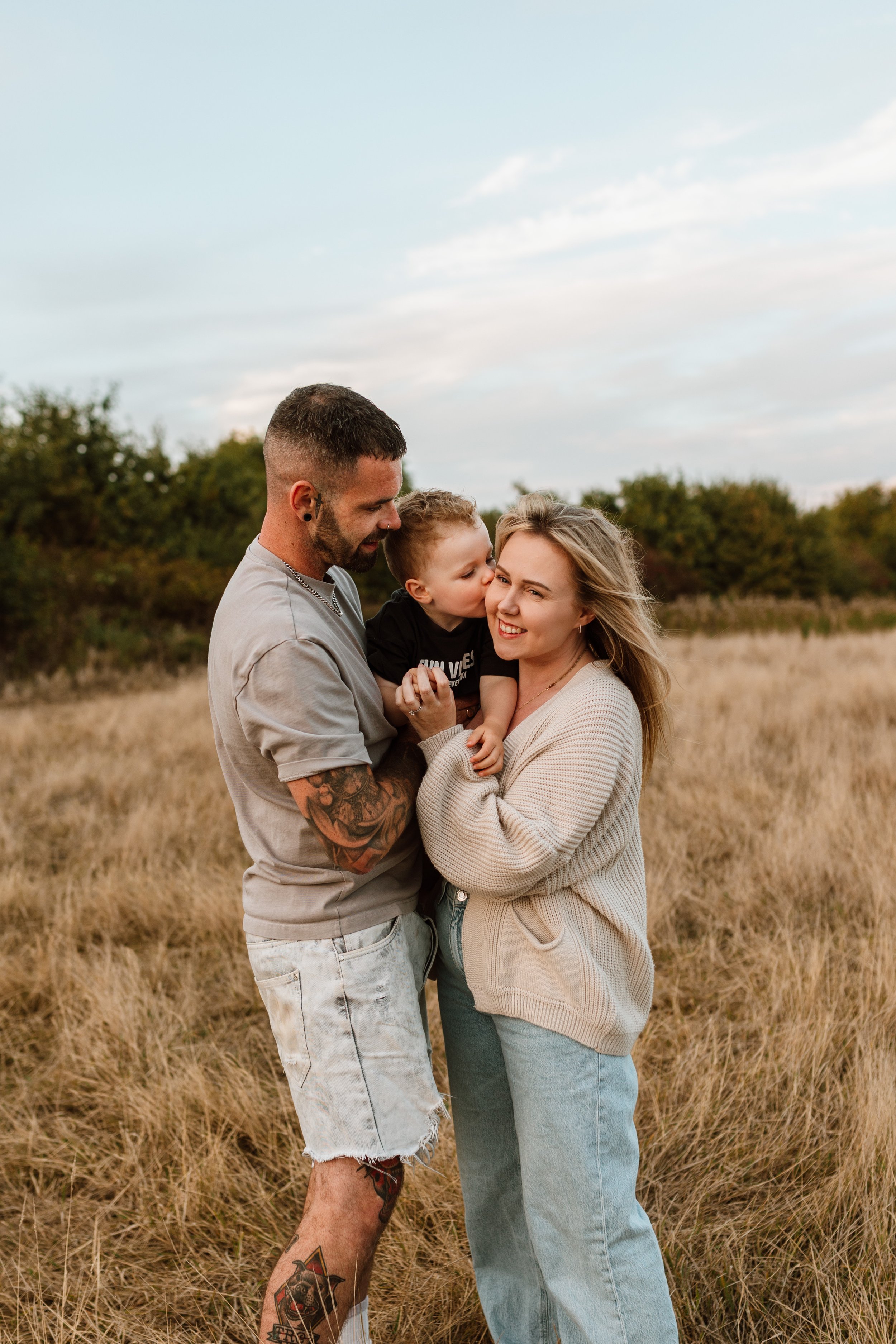 Lifestyle family photography session in a park in Oakville with relaxed, candid moments