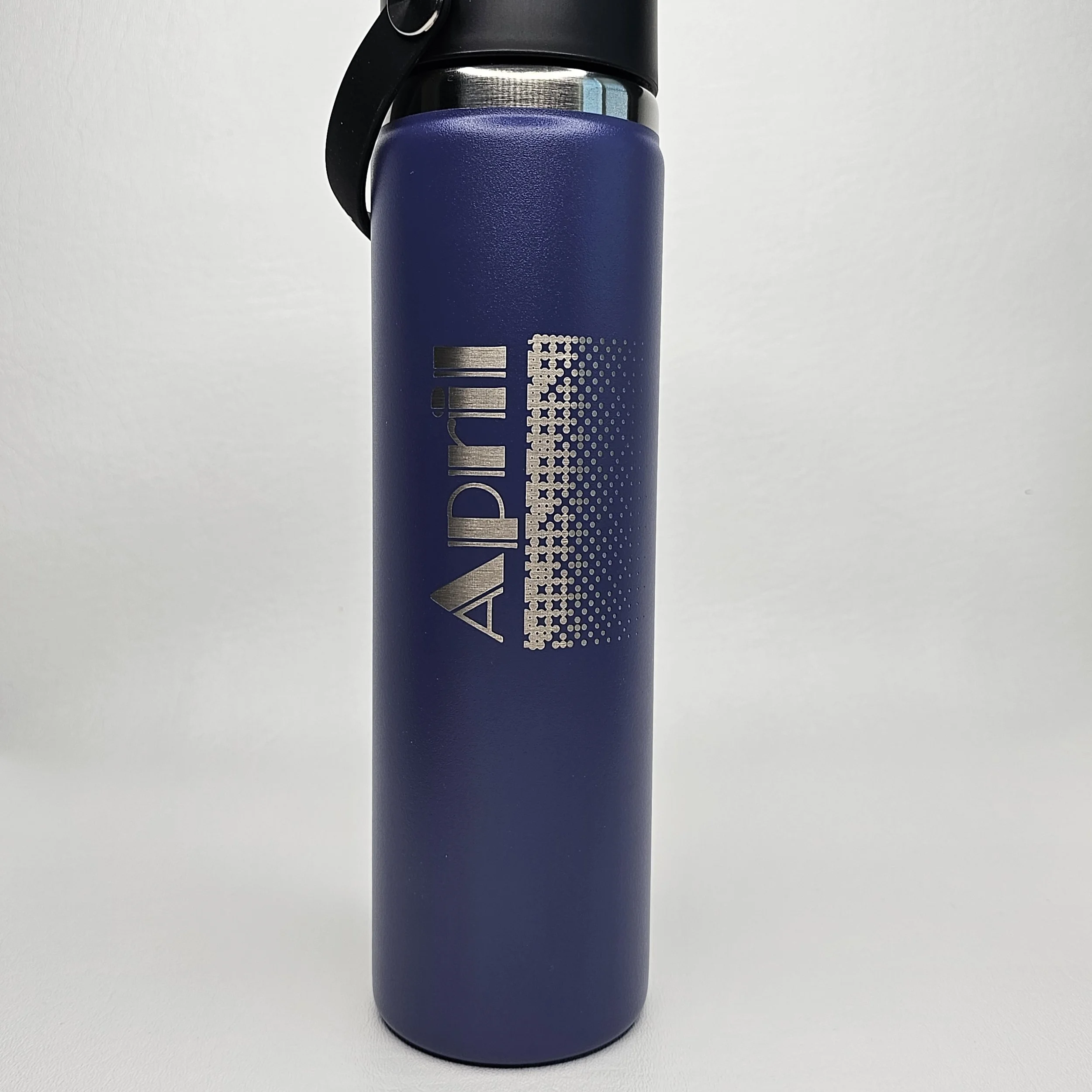 Blue insulated water bottle with a black lid and handle, featuring a silver logo reading 'AIDMI' on the front against a plain white background.