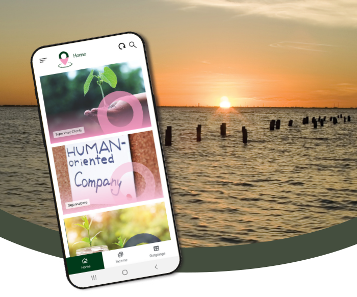 Smartphone displaying a website about environmental or human-centered initiatives, with a sunset over a body of water and wooden posts in the background.