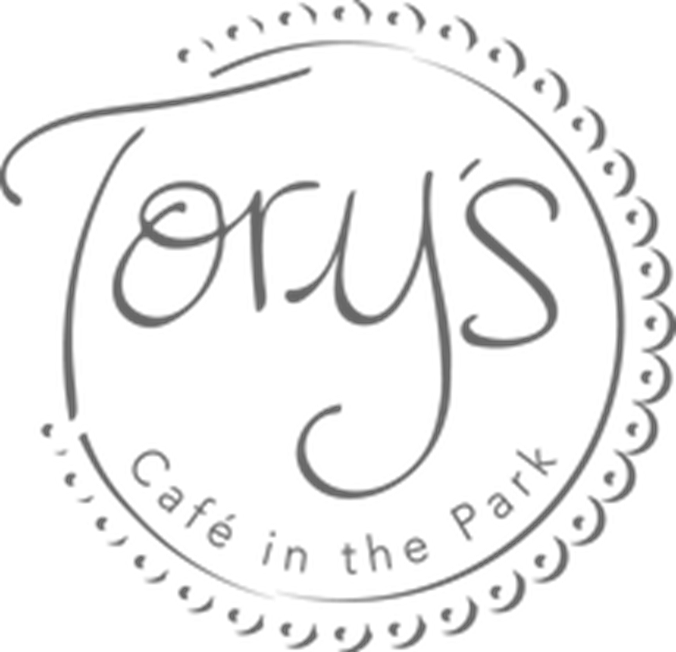Logo of Tory's with the text "tory's" in stylized cursive and "cafe in the park" below, all surrounded by a dotted circular border.