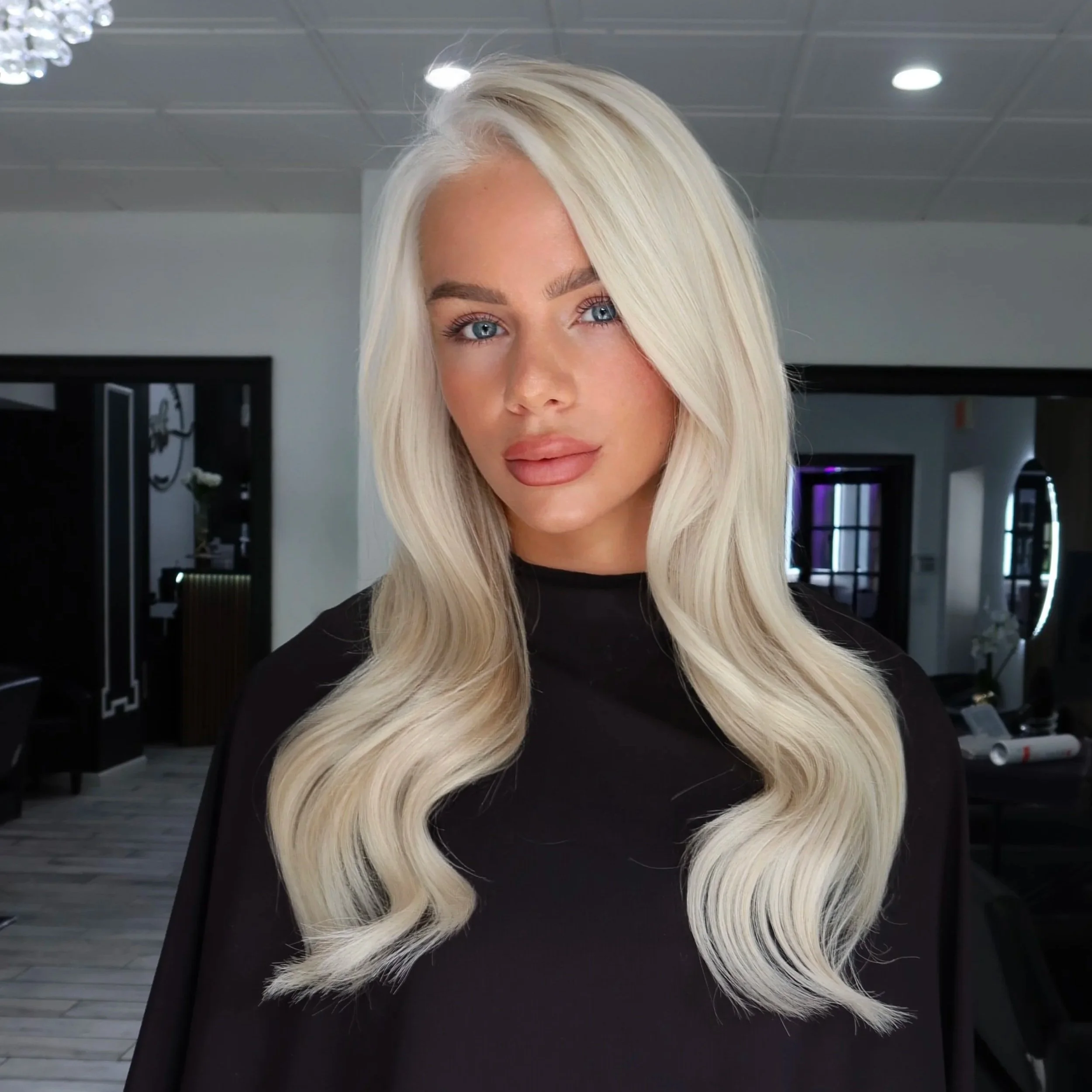 Hair color and extensions preformed at Salon amoura near ucf, downtown Orlando, Avalon park, Waterford lakes, and oviedo specializing in hand tied hair extensions hair tinsel on vicky derrico wwe refree