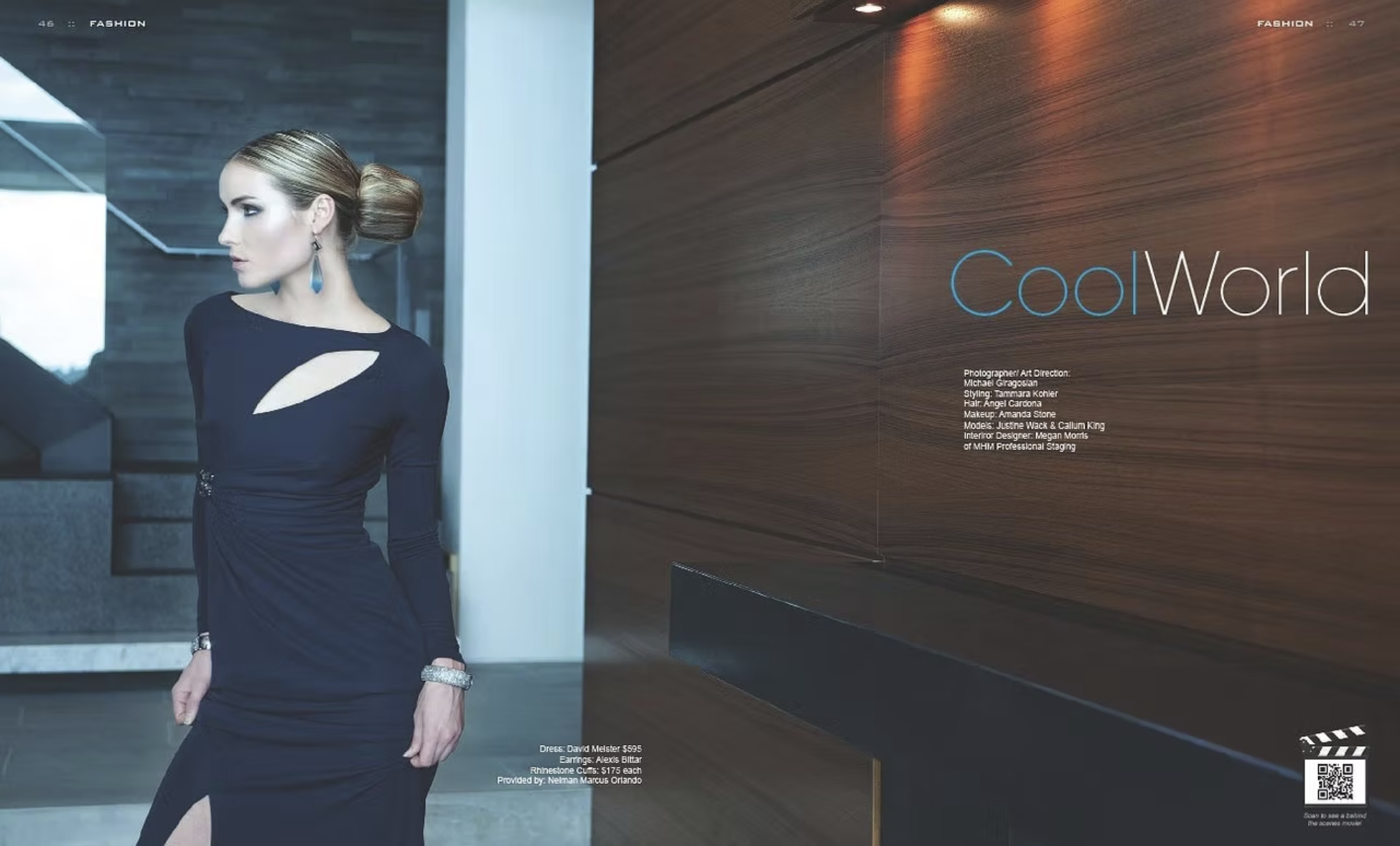 A woman in a black dress with cut-out details posing indoors with modern wood paneling in the background.