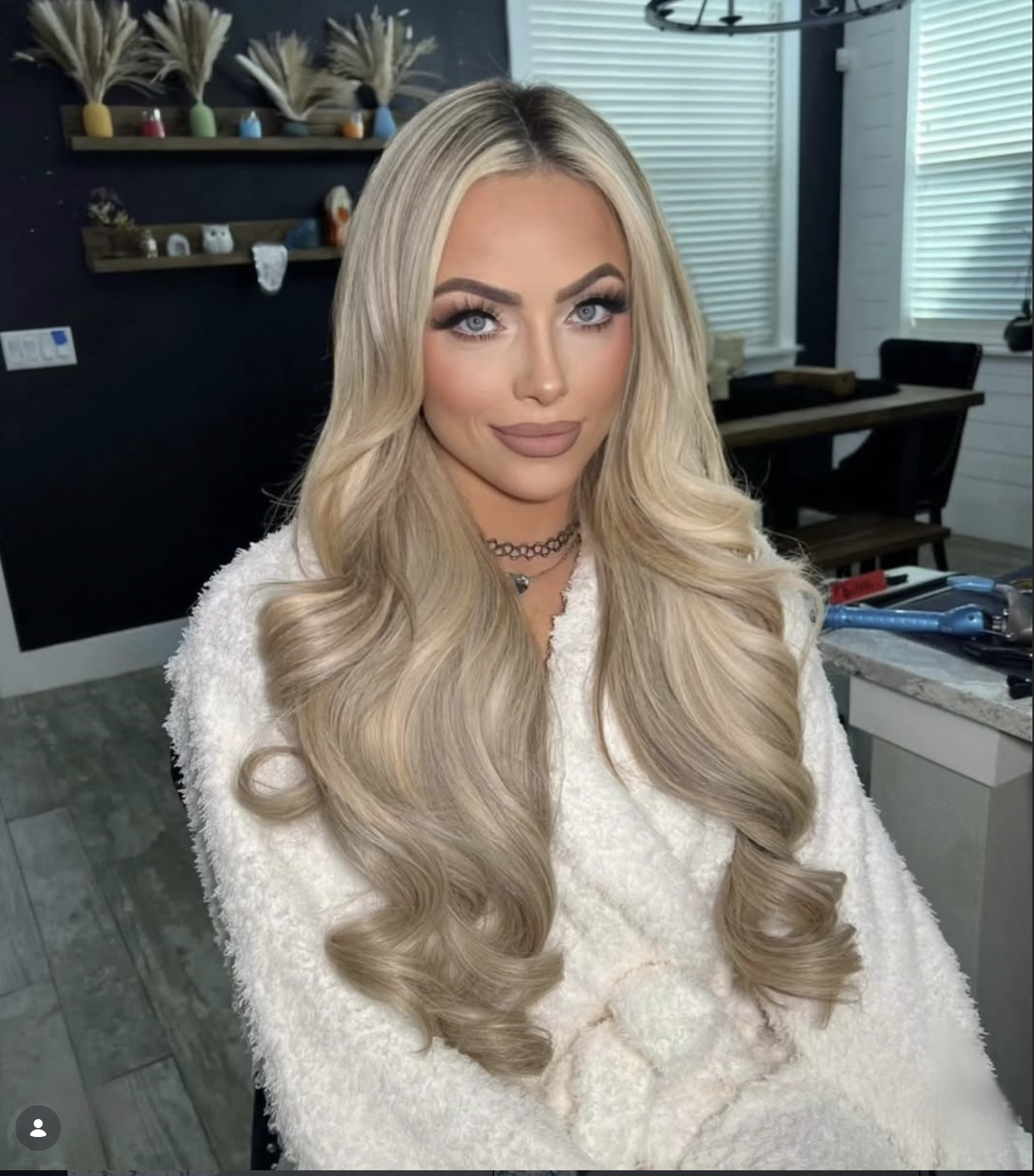 Blonde highlights and extensions on WWE superstar LIV morgan using By amoura Wefts
