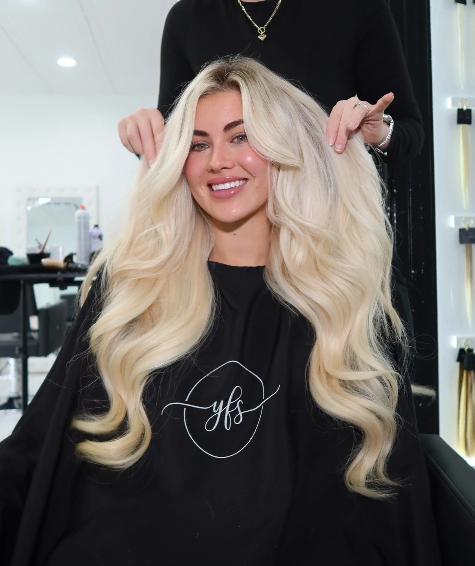 One row of hand tied extensions and Blonde highlights done on Meghan wALKER WWE 