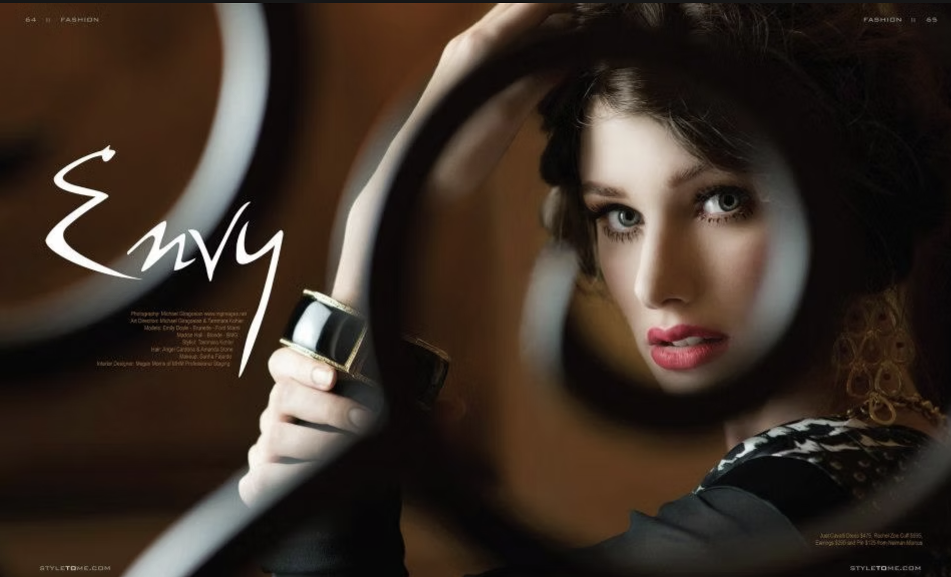 A woman looking into a mirror, with her reflection visible. She has blond hair, blue eyes, and is wearing makeup. The image is part of a fashion or beauty photoshoot, with text overlay and a black dress showing intricate patterns.