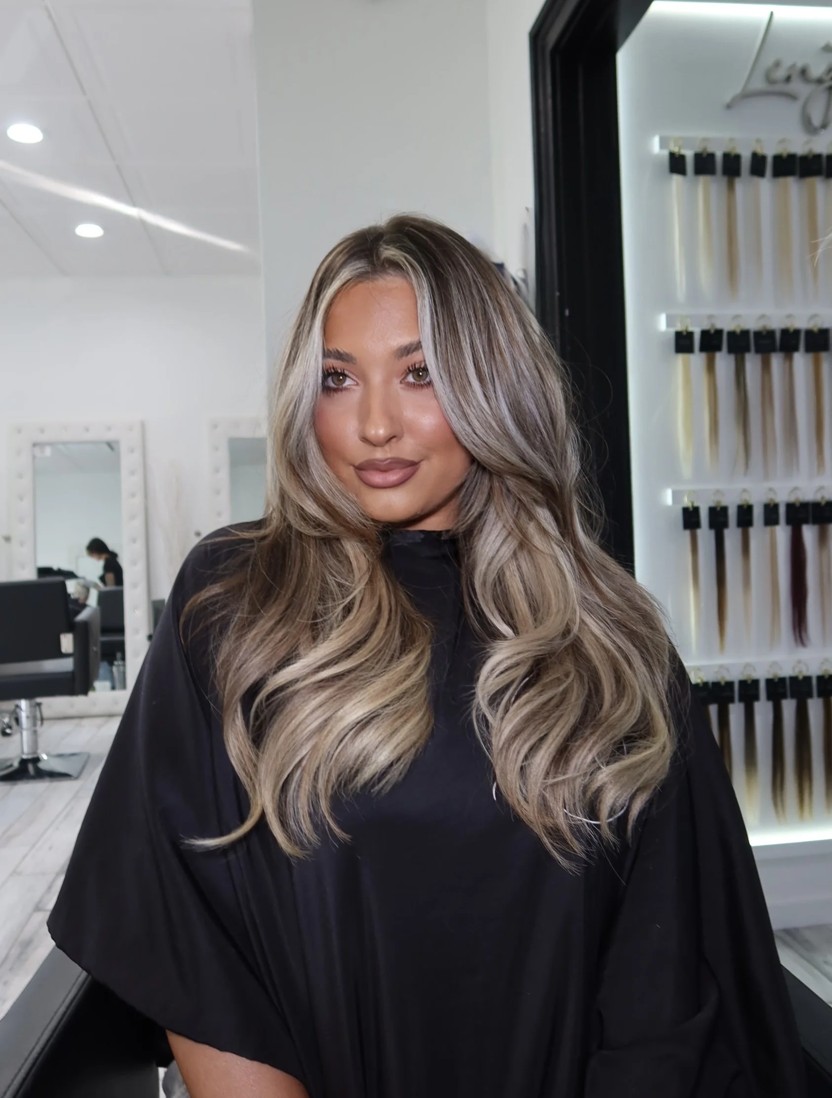 Hair color and extensions preformed at Salon amoura near ucf, downtown Orlando, Avalon park, Waterford lakes, and oviedo specializing in hand tied hair extensions hair tinsel on by nicole maddie