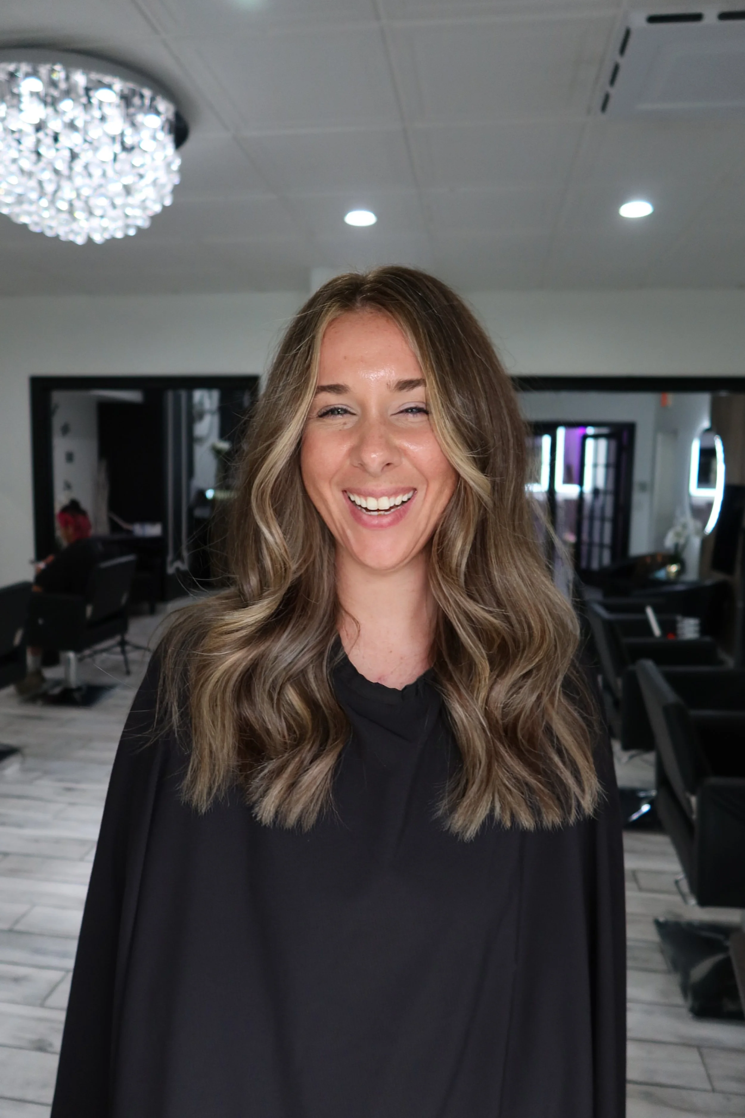 Hair color and extensions preformed at Salon amoura near ucf, downtown Orlando, Avalon park, Waterford lakes, and oviedo specializing in hand tied hair extensions hair tinsel on