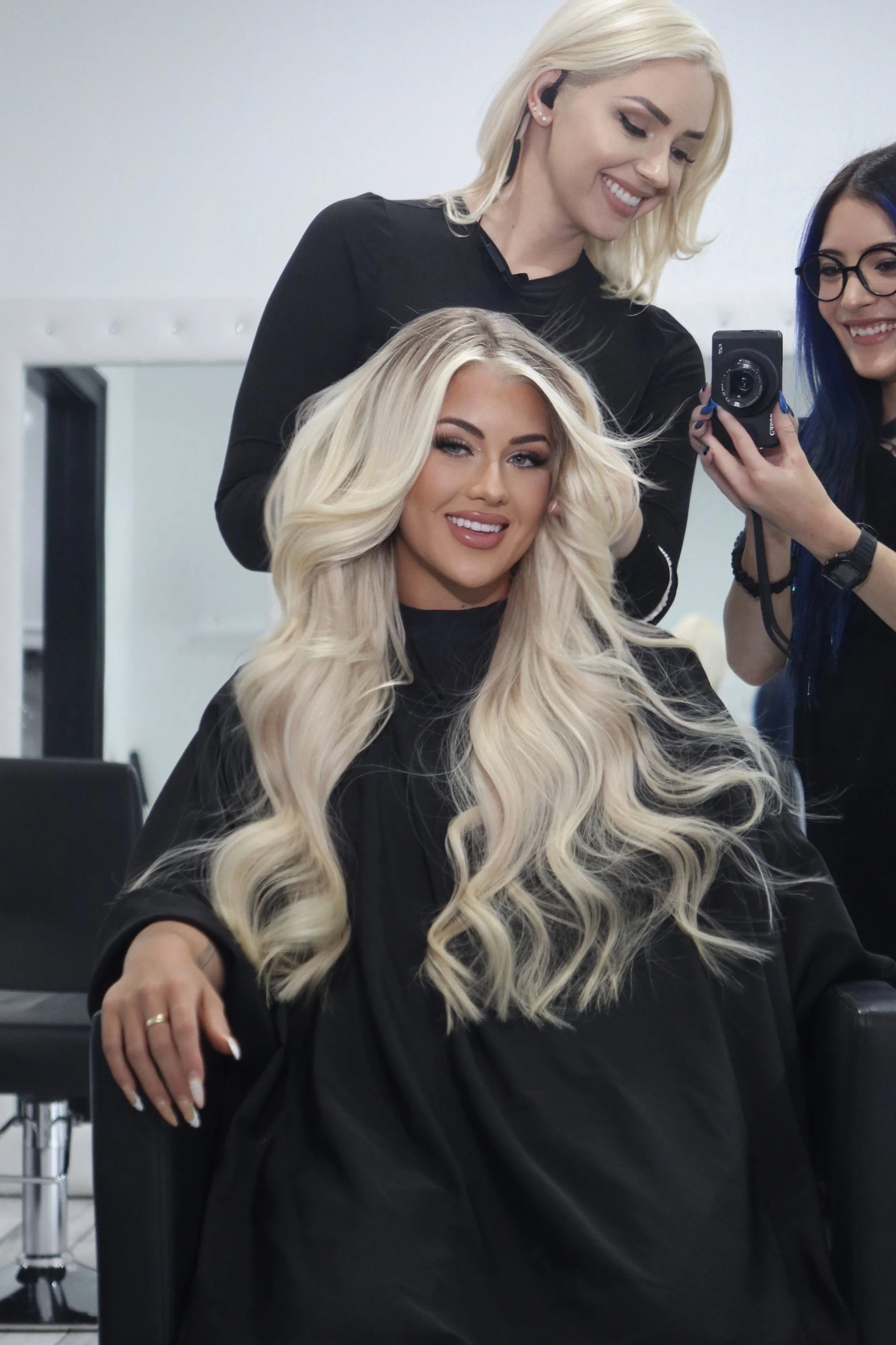 24 inch blonde hair extensions done at Salon Amoura in Orlando Florida.
