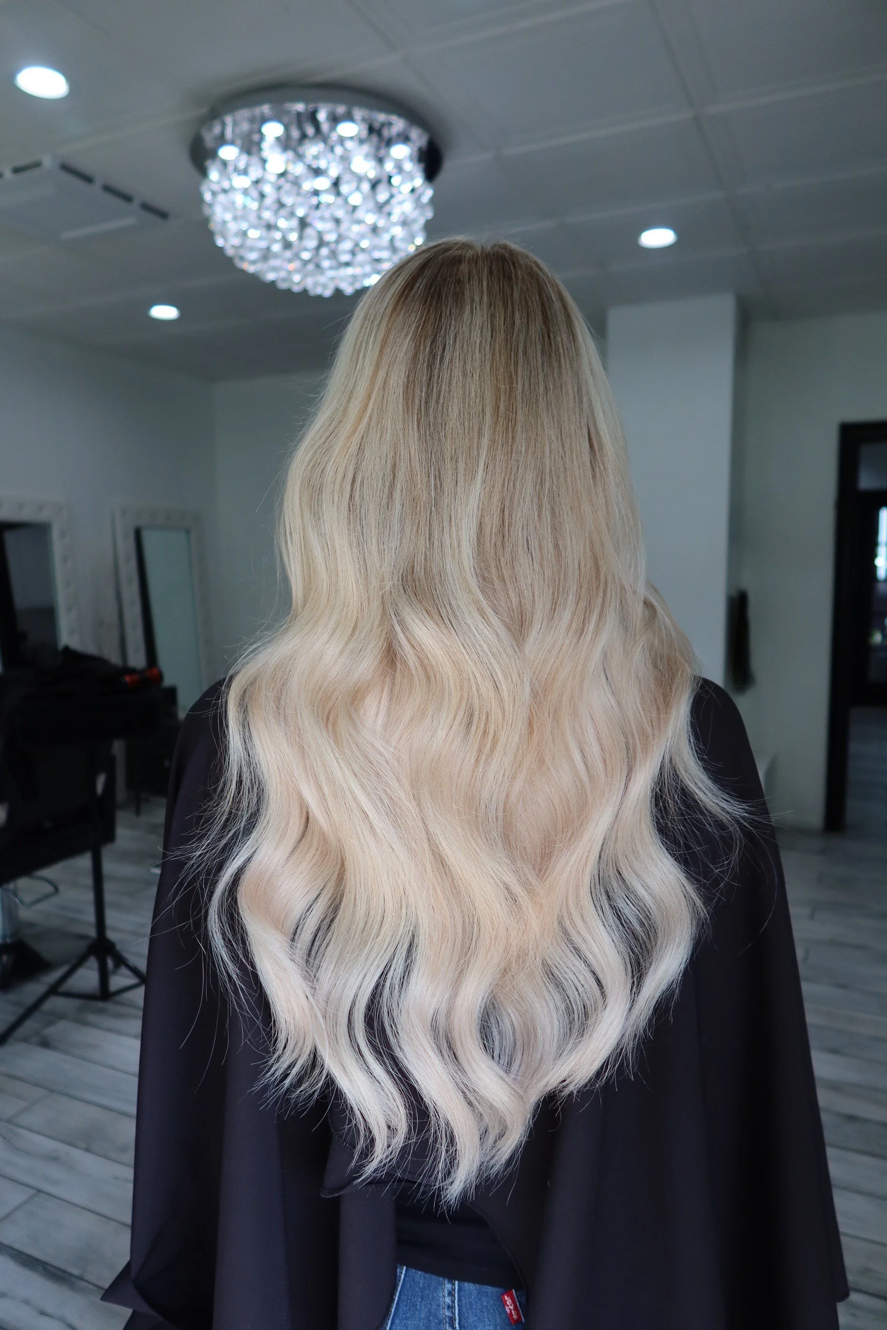 Hair color and extensions preformed at Salon amoura near ucf, downtown Orlando, Avalon park, Waterford lakes, and oviedo specializing in hand tied hair extensions