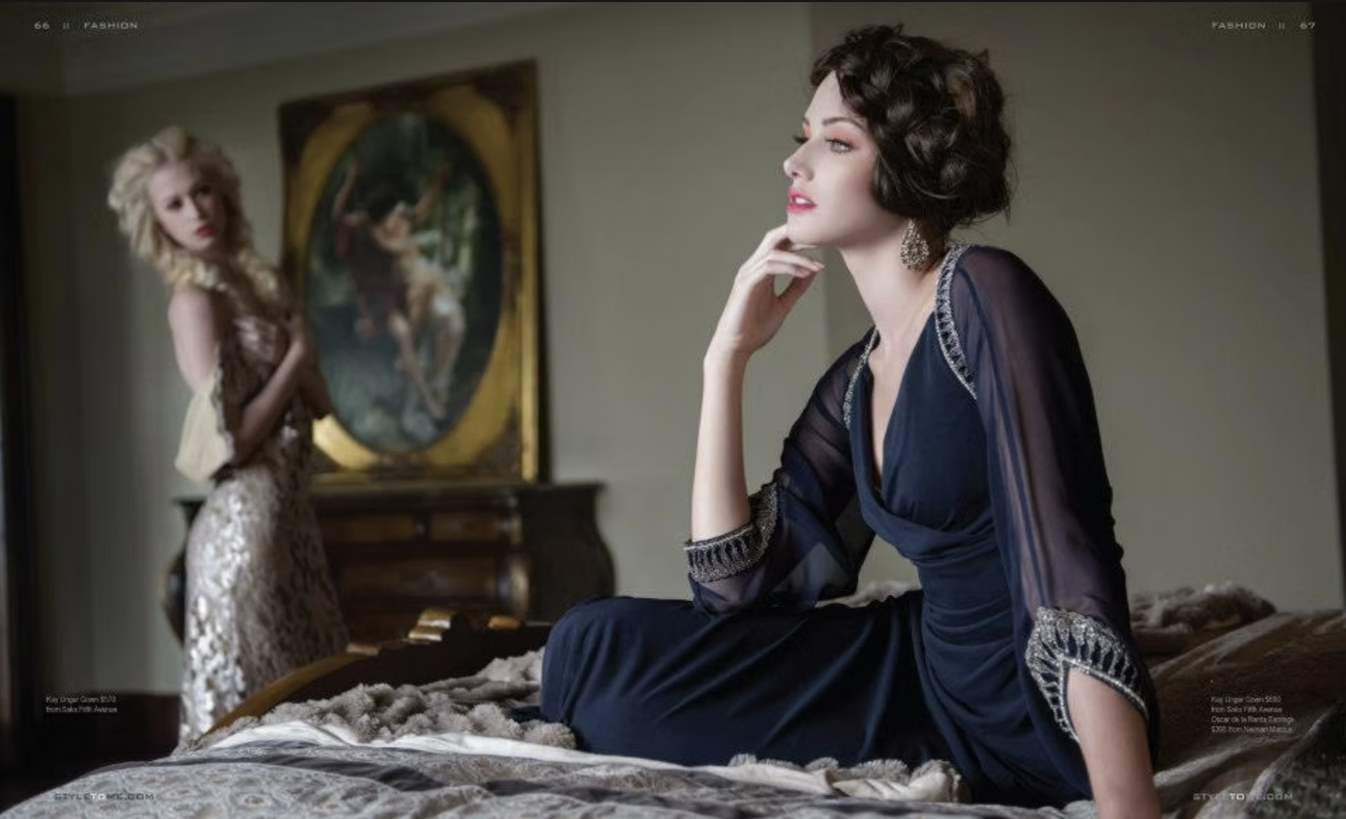 Two women in elegant dresses in an ornate room; one is sitting on a bed with her chin resting on her hand, the other stands in the background near a painting.
