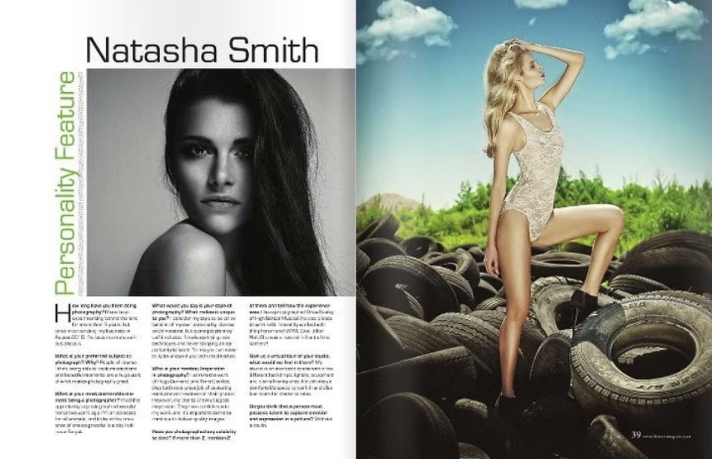 Magazine spread featuring Natasha Smith on the left in black and white portrait, and on the right, a woman in beige lace bodysuit posing on a pile of tires against a background of blue sky with clouds and green trees.
