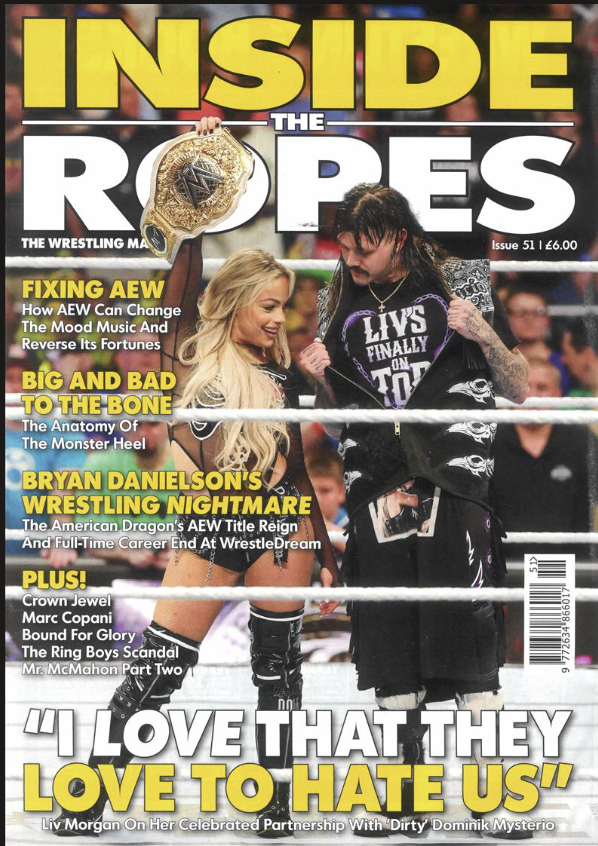A wrestling magazine cover titled 'Inside the Ropes.' It features a photo of two professional wrestlers, a woman and a man, inside a wrestling ring. The woman has long blonde hair, is smiling, and holding a championship belt above her head. The man h