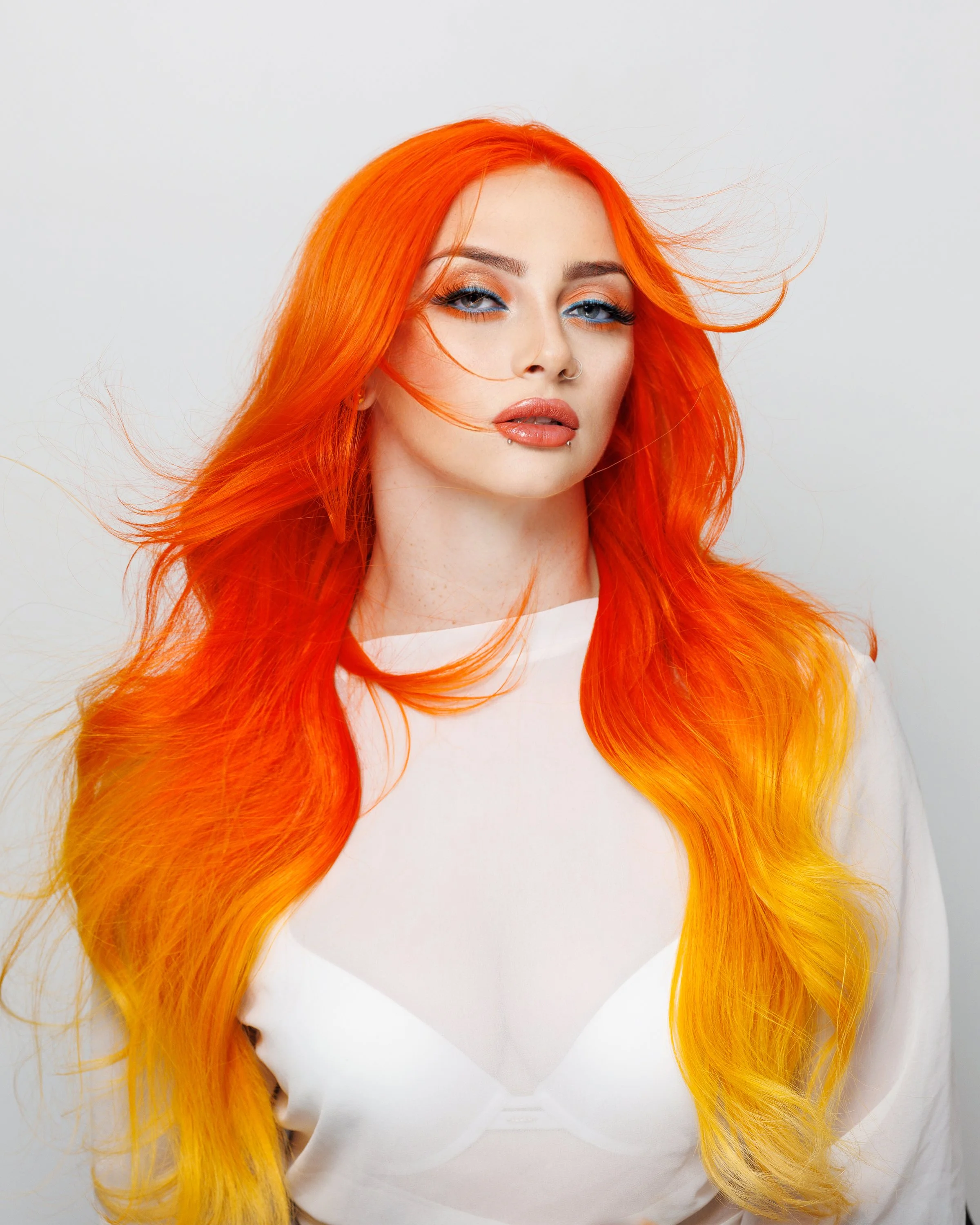 Orange and yellow fantasy hair color at Salon Amoura Orlando