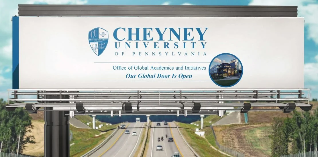 Billboard for Cheyney University of Pennsylvania with campus image and highway below.