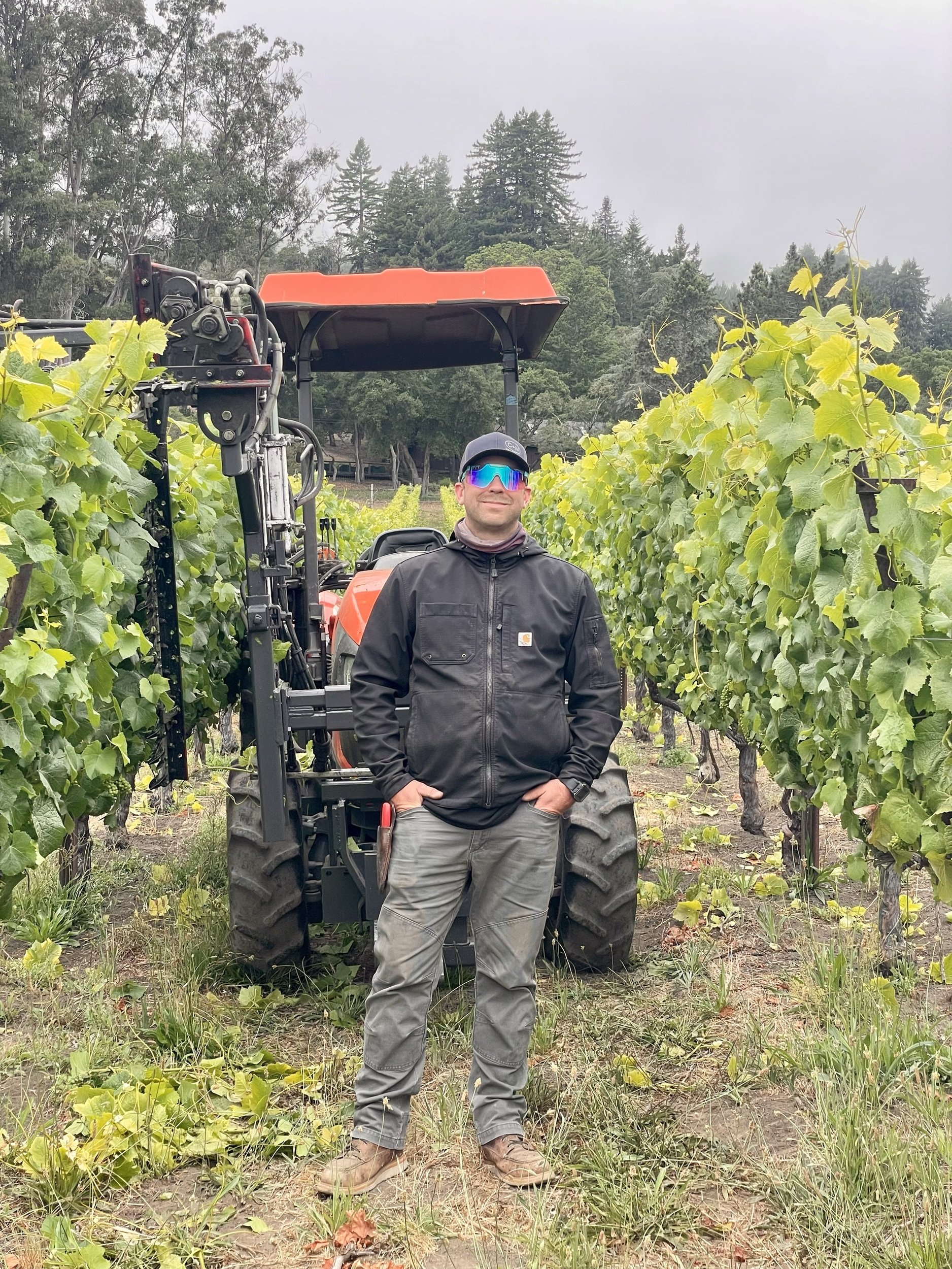 tyler-tractor-vineyard.jpg