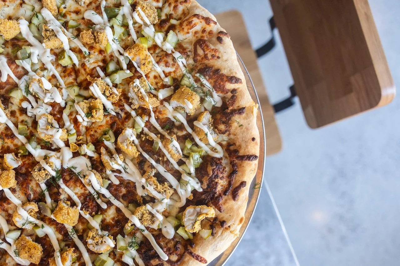 The secret's out. 🍕🐟

Our Perch &amp; Dill Pickle Pizza is making headlines, and Bay City can&rsquo;t stop talking about it. Thanks to everyone who's helped make North Peak feel at home these first few weeks. If you haven't tried the pizza everyone