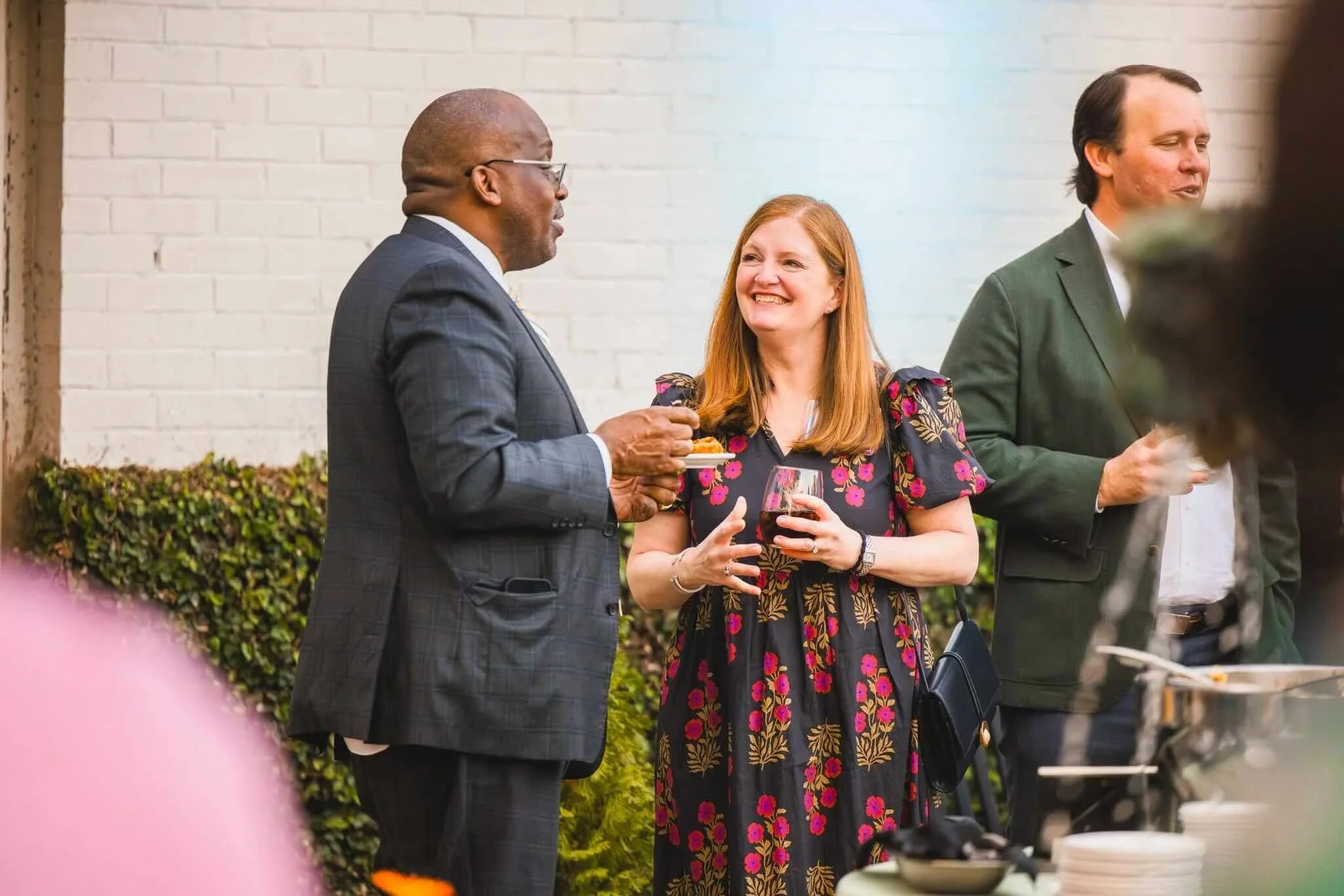 Three attendees at CFM's Giving Forward event.