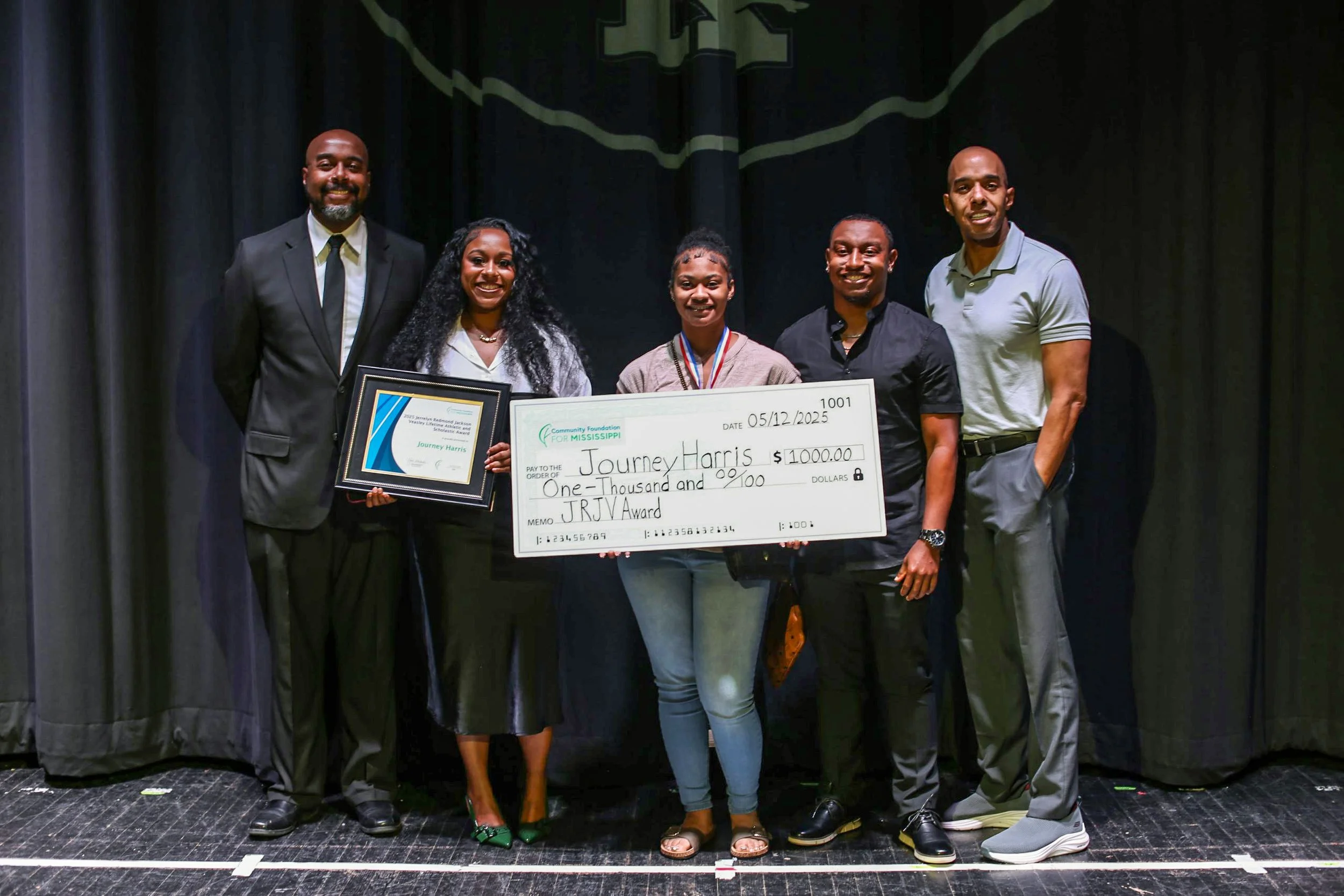   Journey Harris, the first ever recipient of the Jerrelyn Redmond Jackson Veasley Lifetime Athletic and Scholastic Award Endowed Fund  