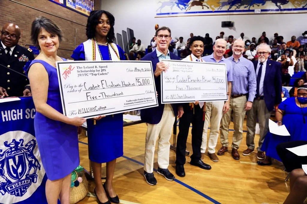 Jane Alexander, President & CEO of the Community Foundation for Mississippi; Cadet Elizabeth Hawkins, William VanDevender, Cadet Brandon Brown, Stuart Speed, Warren Speed, Ashby Foote, Ward 1 Jackson City Council Member pose together