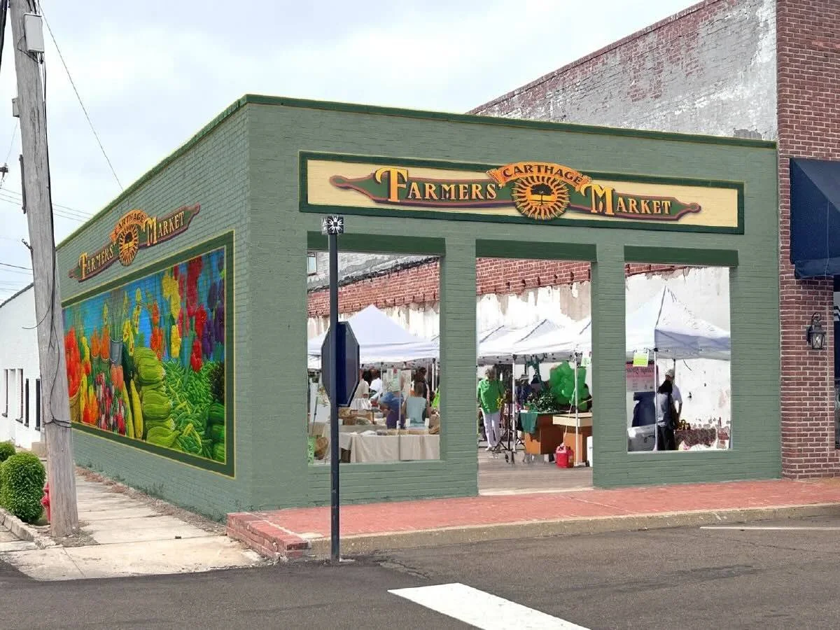  Proposed facade improvements for a building that sits empty at a prominent corner just off the Courthouse Square in Carthage. 