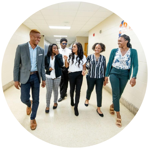 Townsend (left) with students.