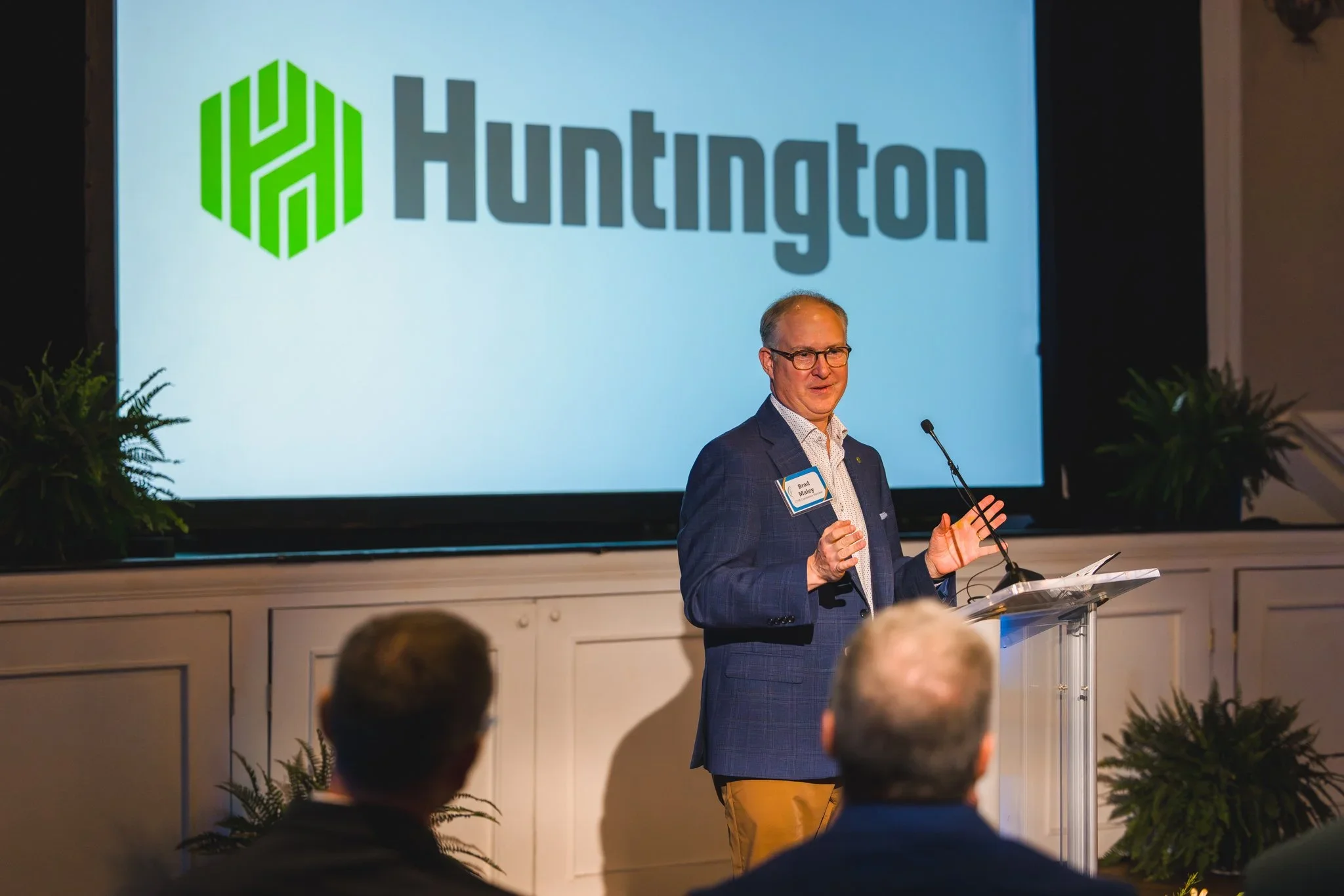 Brad Malay of Huntington Bank speaks at CFM's Giving Forward event.
