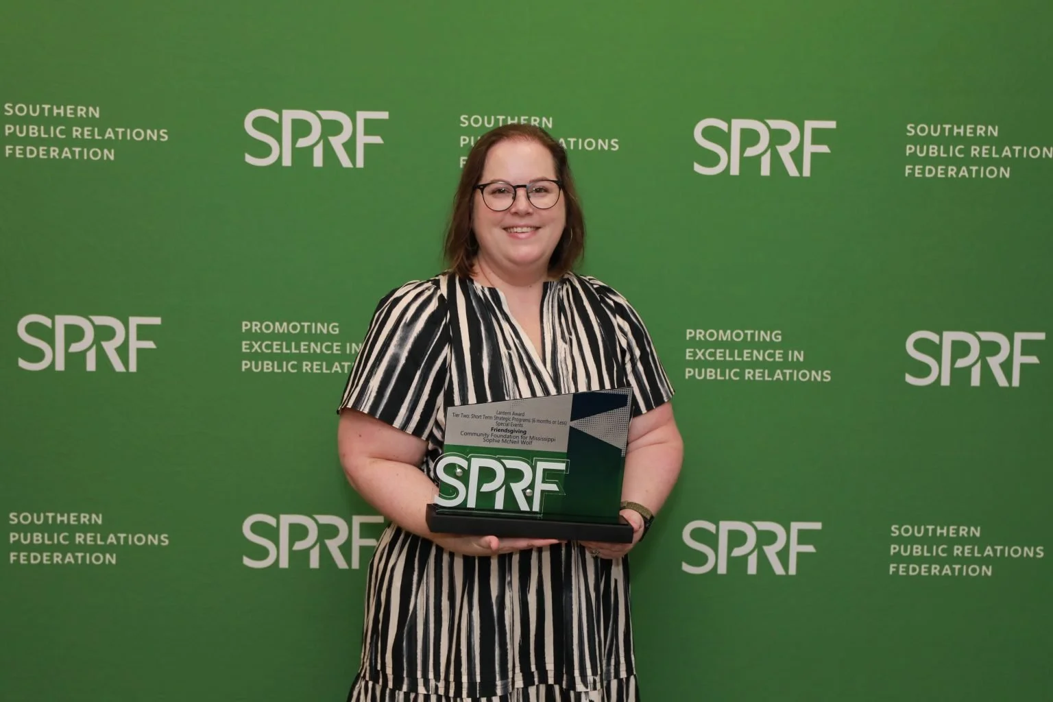 Sophie McNeil Wolf being awarded by SPRF