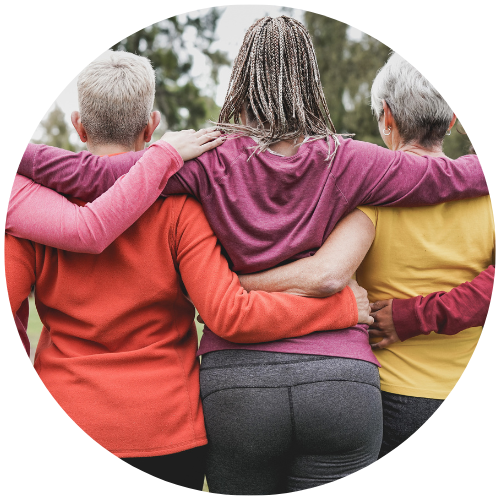 circle photo of three women when their arms around each other's shoulders