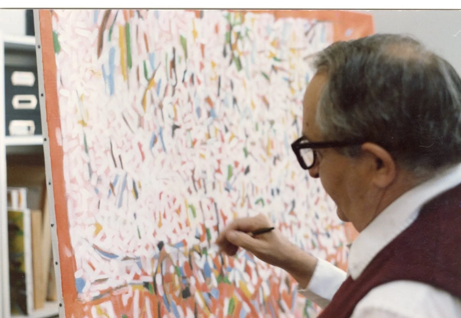 Andrew Bucci paints in his Maryland studio in 1990.