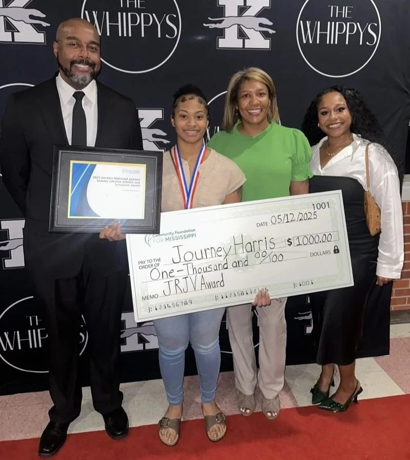 Journey Harris received the first award from the Jerrelyn Redmond Jackson Veasley Lifetime Athletic and Scholastic Award Endowed Fund.