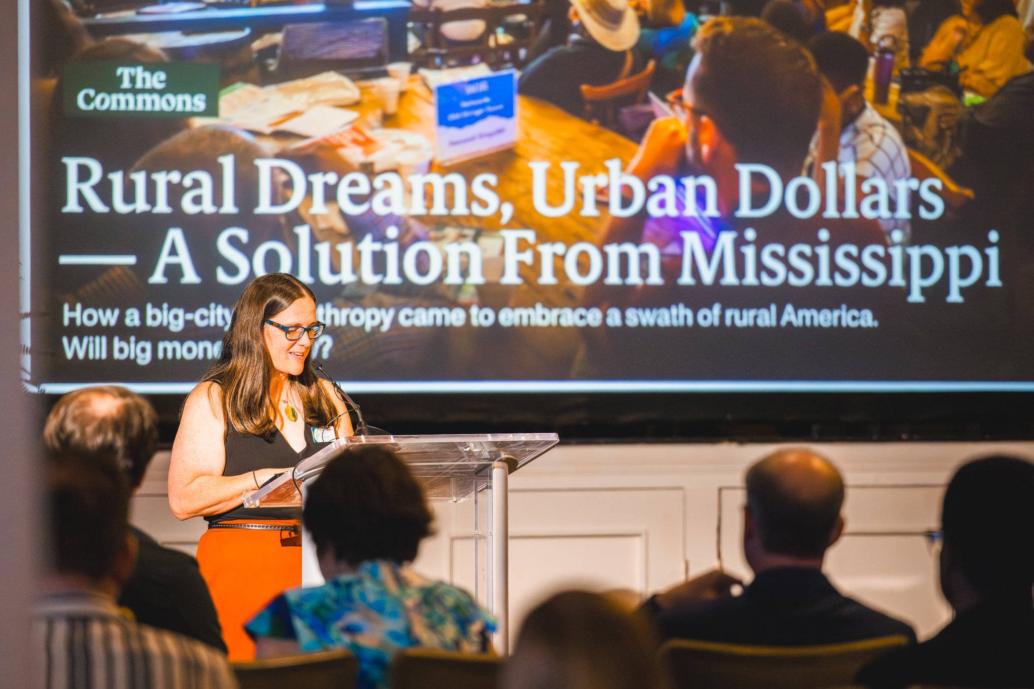 Melody Moody Thortis, CFM's Director of Strategic Impact & Programs, speaks at the 2026 Giving Forward event.
