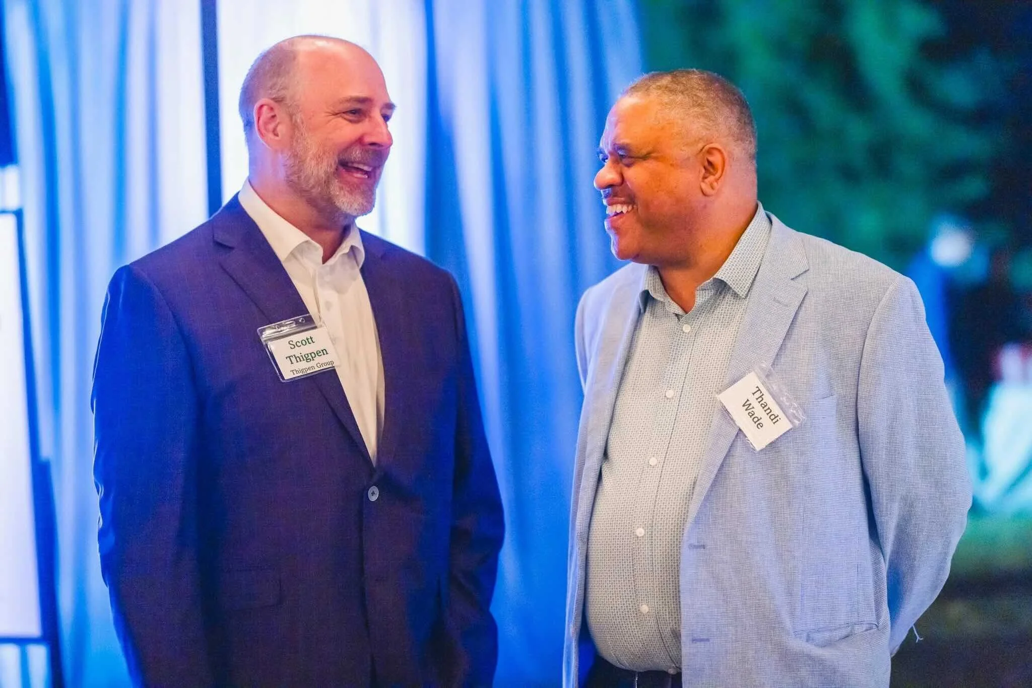Scott Thigpen and Thandi Wade talk at CFM's annual Friendsgiving event.