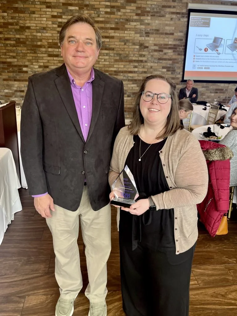 2022 PRAM Central President Bill Moak, APR stands with Sophie McNeil Wolf during the award presentation.