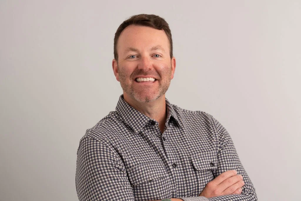 Headshot of smiling male