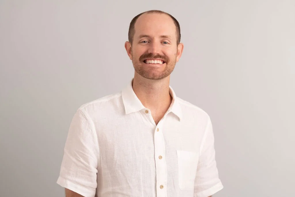 Headshot of smiling male