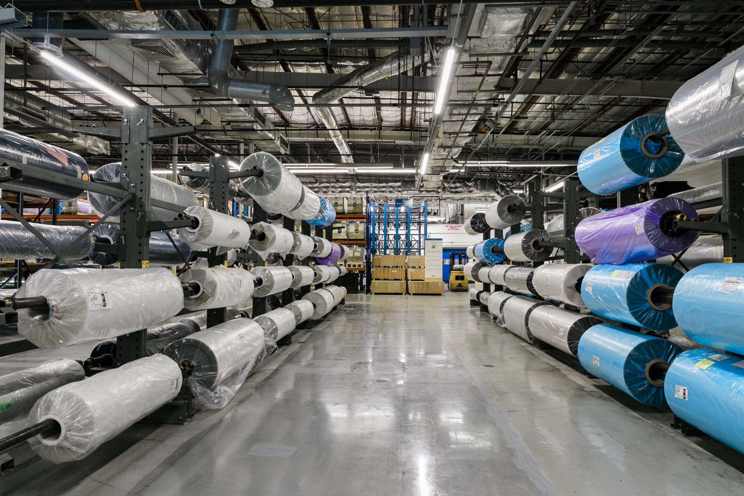 Madico warehouse interior with industrial rolls. perspective shot
