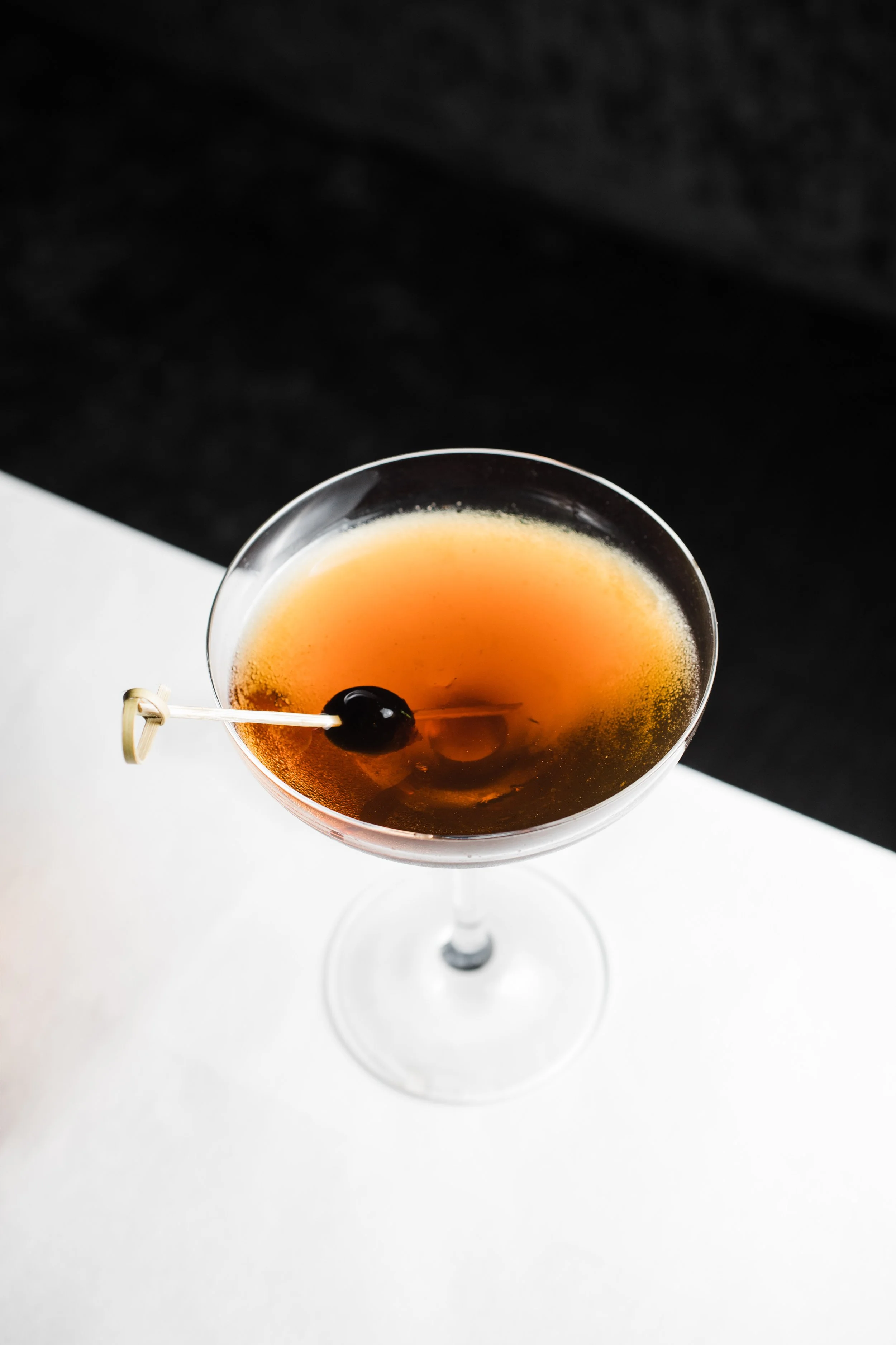 cocktail with black and white background at Mise En Place